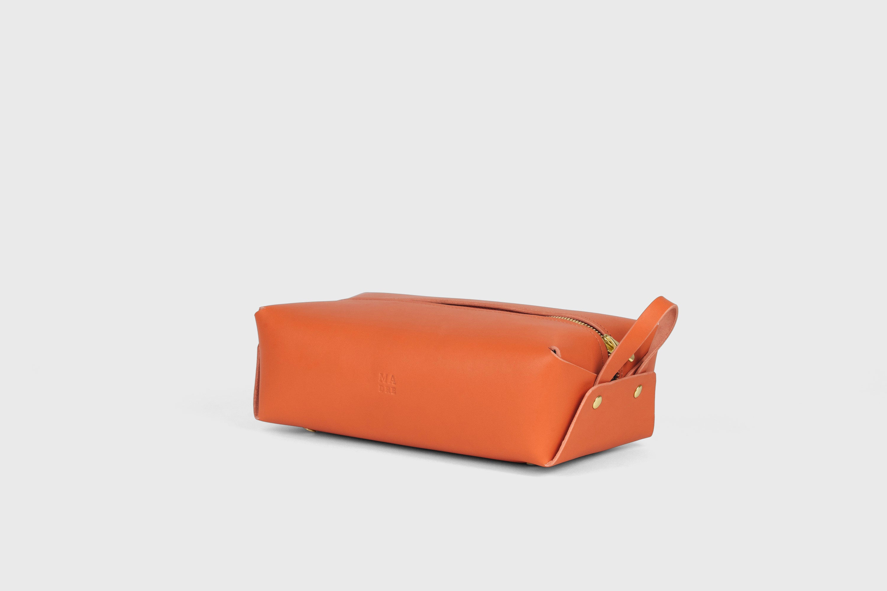Dopp Kit Orange Color Leather Toiletry Bag Make Up Pouch Travel Pack Hygiene Bag Zipper Premium Quality Minimalistic Modern Design Atelier Madre Manuel Dreesmann Barcelona Spain