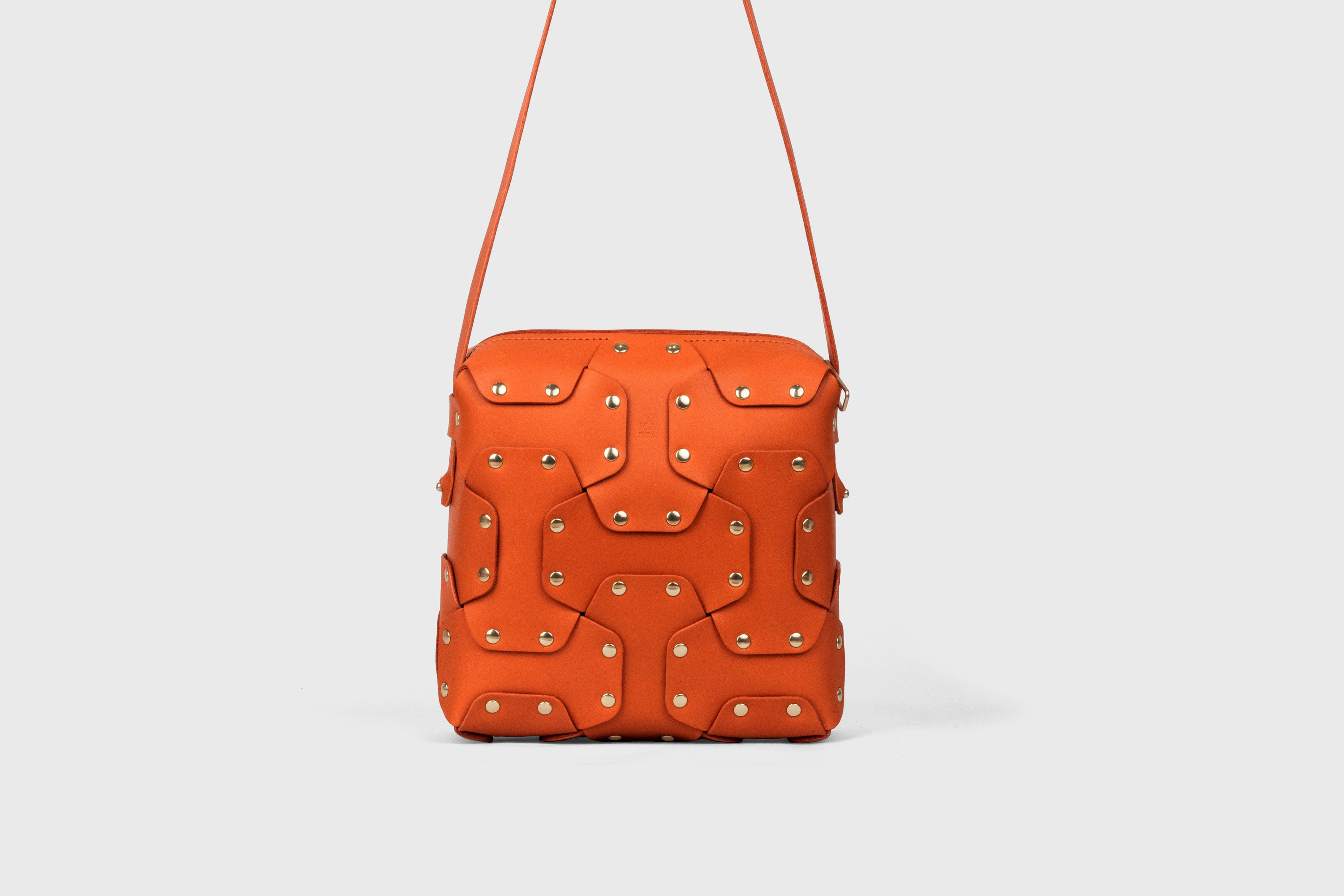 Double Rivet Bag Squared, Orange Colour, Vegetable-Tanned Leather, Modern Minimal Design. Premium Quality, Atelier Madre, Manuel-Dreesmann, Barcelona