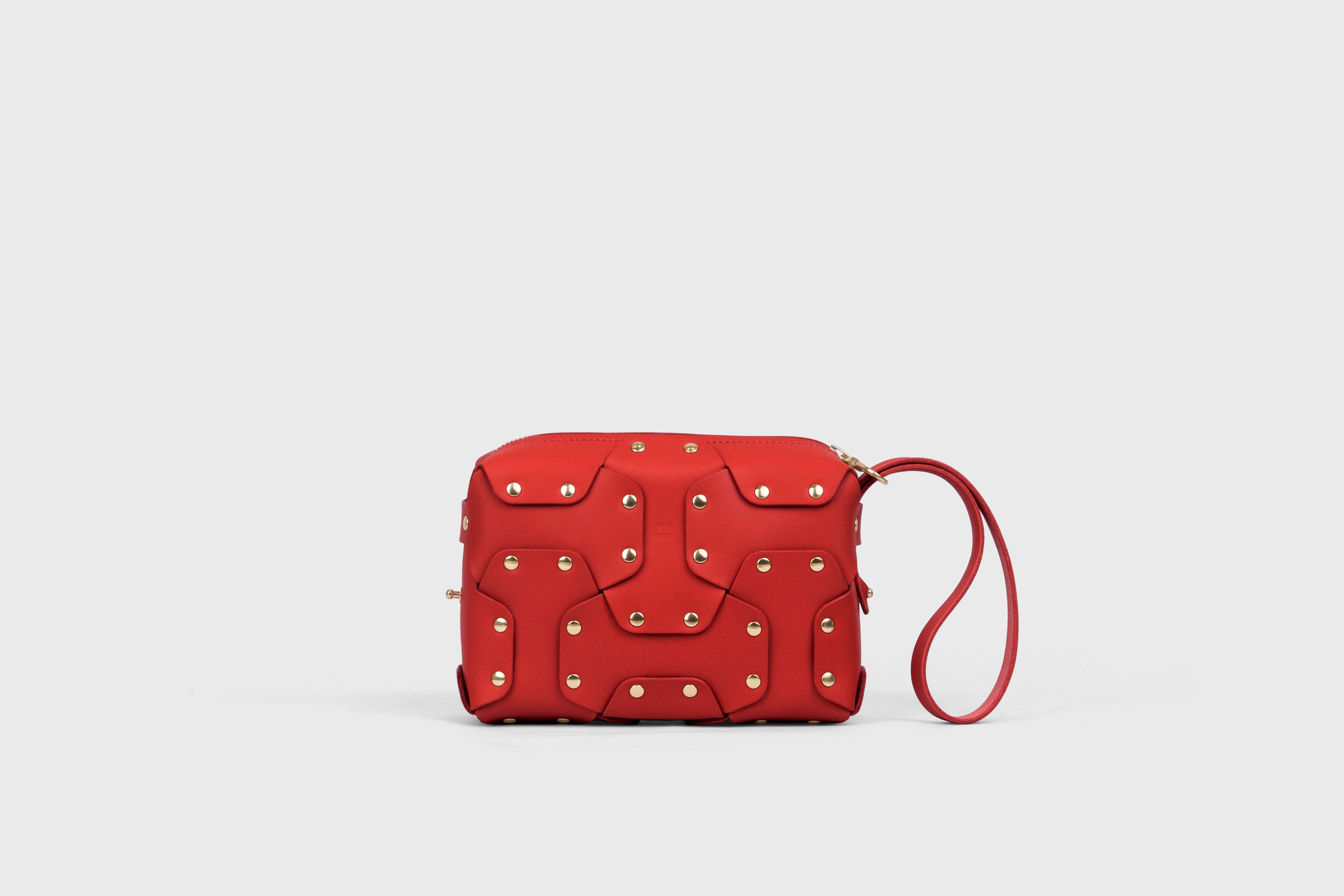 Double Rivet Bag, Red Color, Leather Full Grain Vegetable Tanned Leather Modern Minimalist Design Premium Quality Full Brass Clutch Crossbody Shoulder Bag from Atelier Madre, Manuel Dreesmann Barcelona Spain