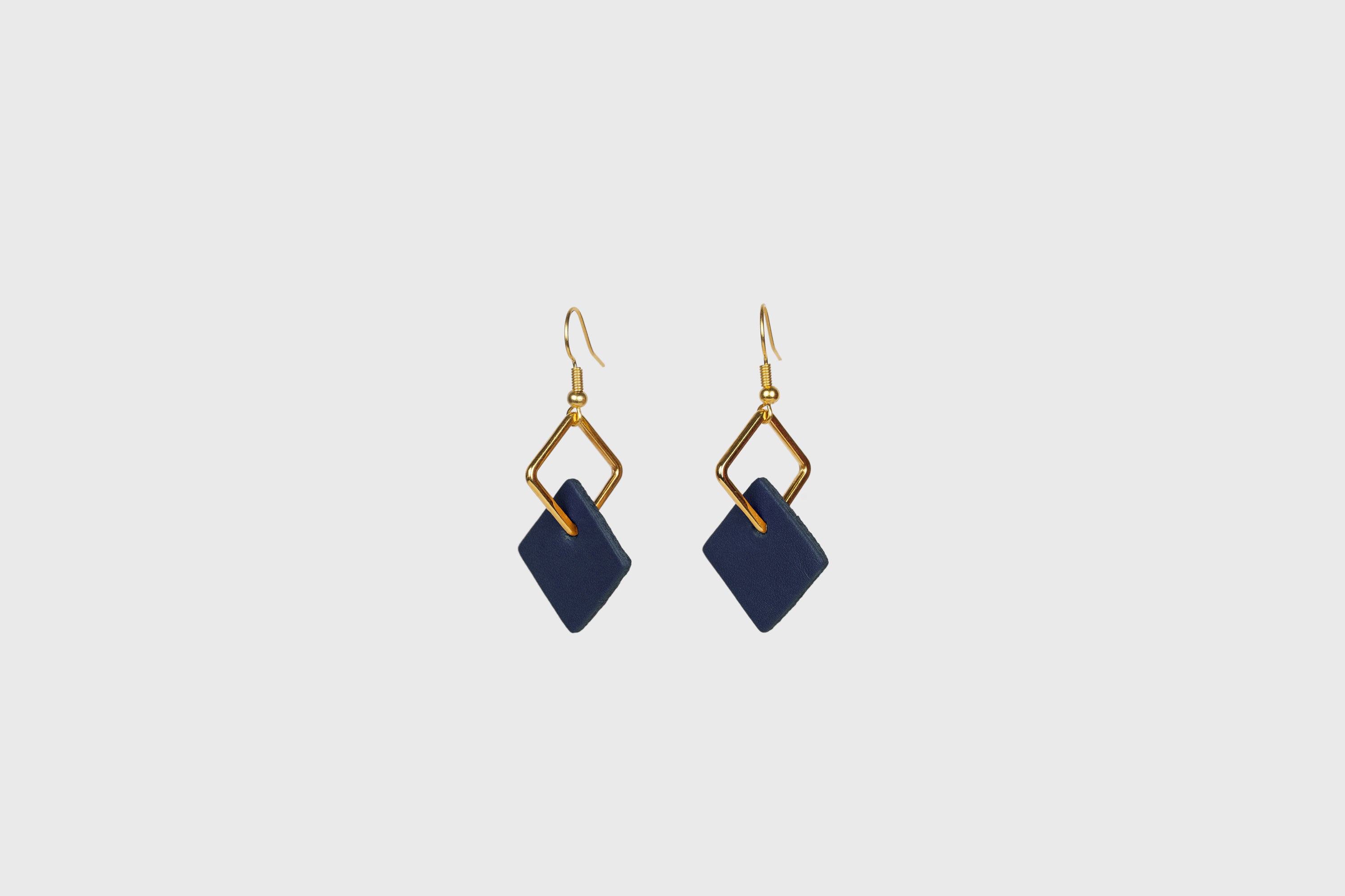 Earrings Chloe In Marine Blue Color In Vegetable Tanned Leather Minimalistic Design Atelier Manuel Dreesmann Barcelona Spain
