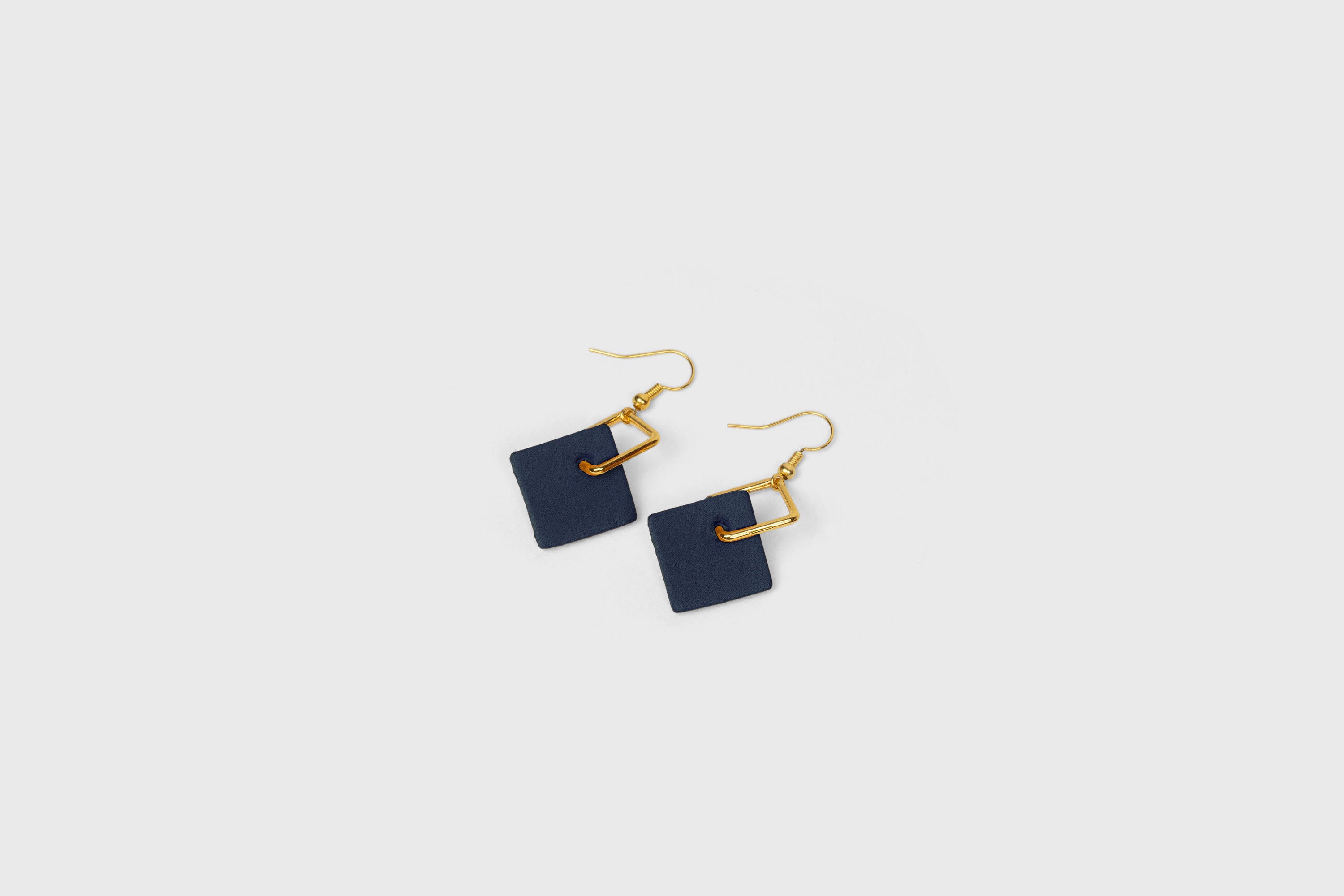 Earrings Chloe In Marine Blue Color In Vegetable Tanned Leather Minimalistic Design Atelier Manuel Dreesmann Barcelona Spain