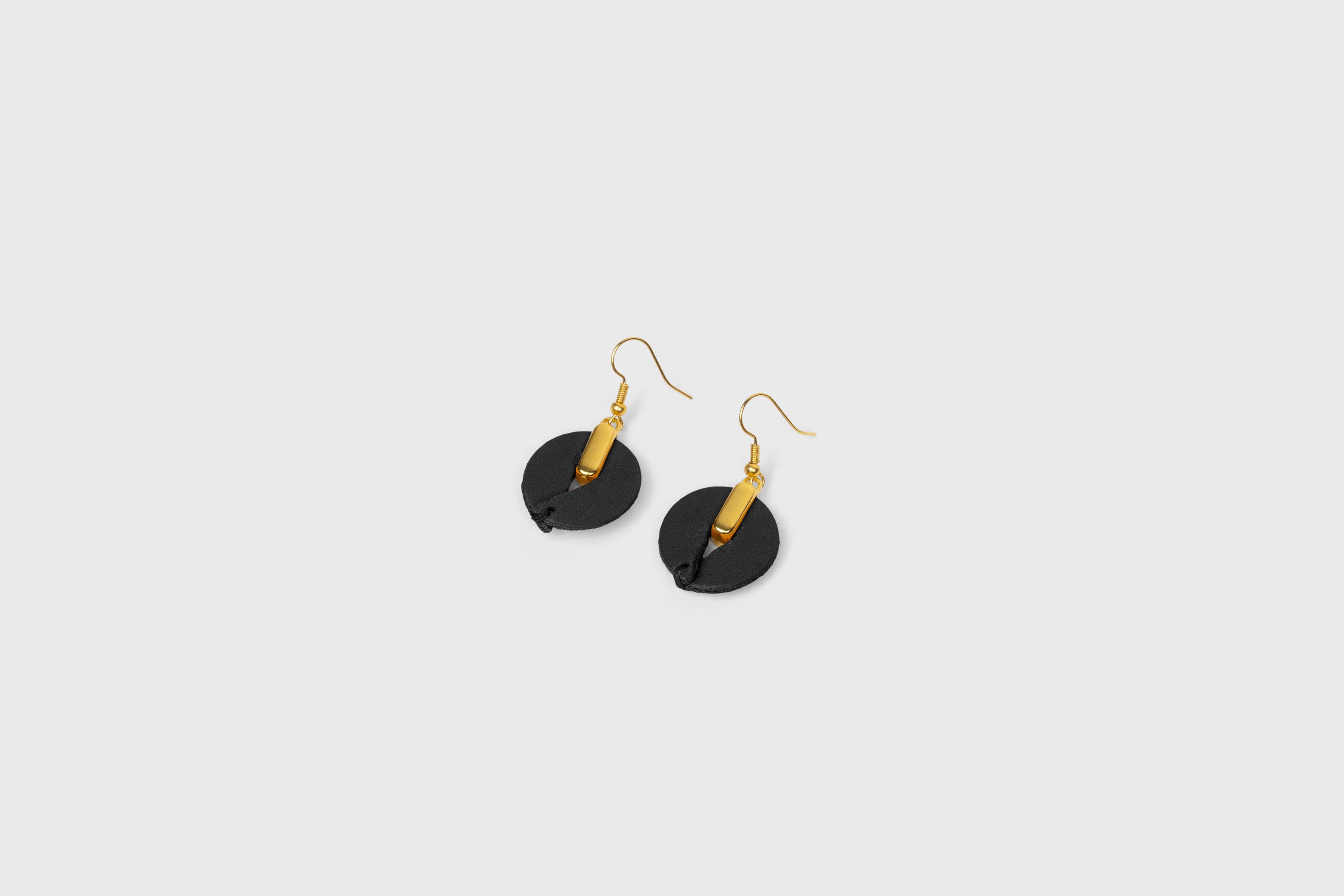 Olivia Earrings in Black Color Vegetable Tanned Leather Minimalistic Design Atelier Madre Manuel Dreesmann Barcelona Spain