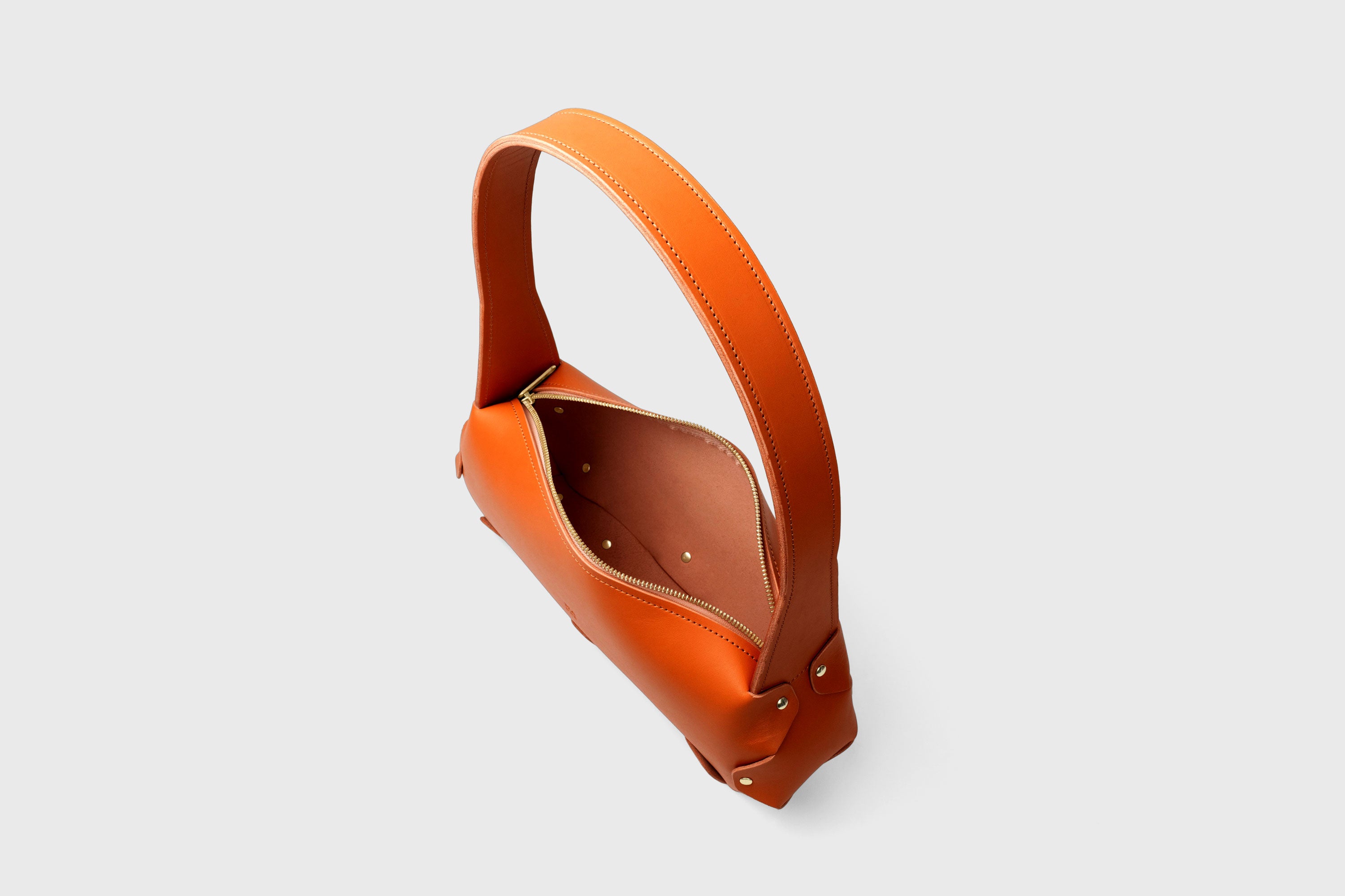 Fiona Bag In Orange Color In Full Grain Vegetable Tanned Leather Minimalistic Design Shoulder Bag Atelier Madre Manuel Dreesmann Barcelona Spain