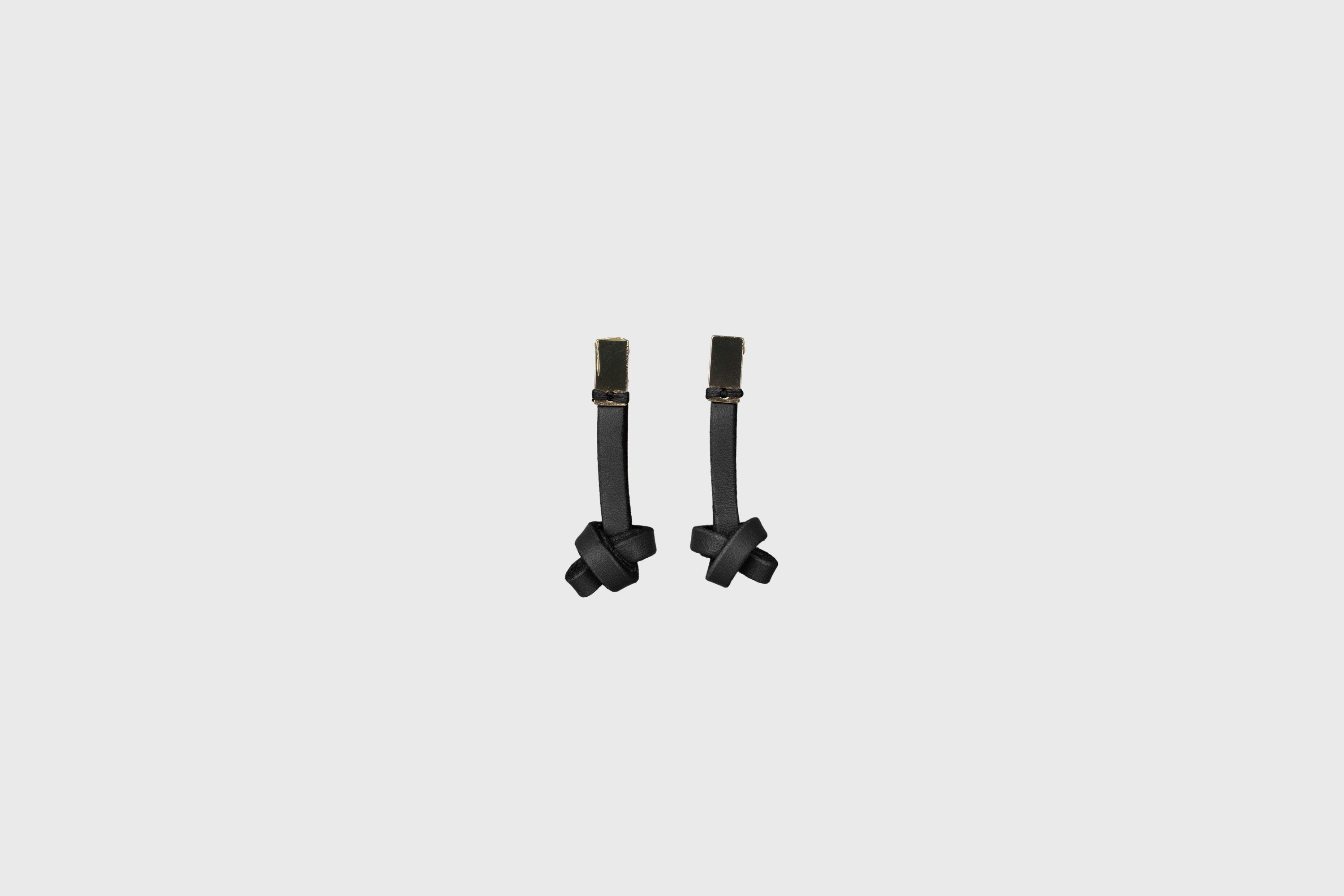 Gaia Earrings In Black Color In Vegetable Tanned Leather Minimalistic Design Atelier Madre Manuel Dreesmann Barcelona Spain
