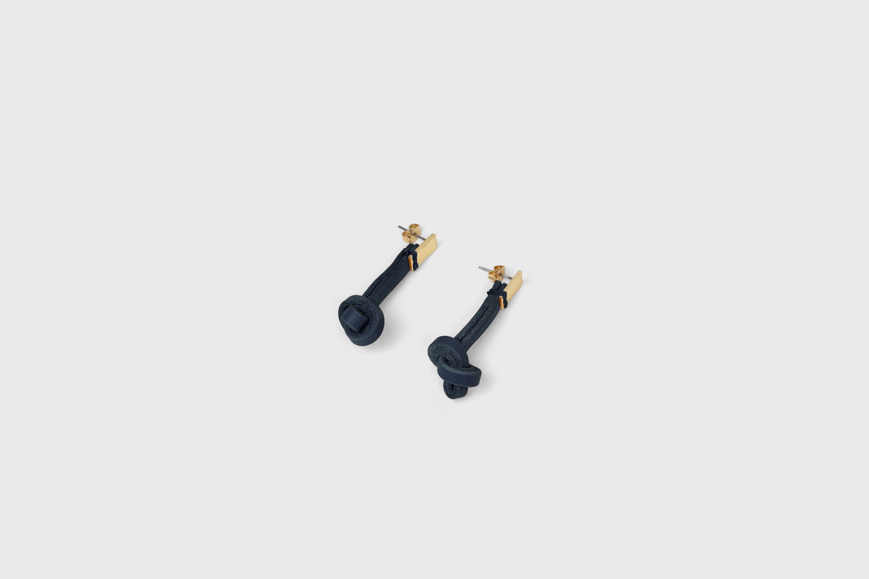 Gaia Earrings In Marine Blue Color In Vegetable Tanned Leather Minimalistic Design Atelier Madre Manuel Dreesmann Barcelona Spain