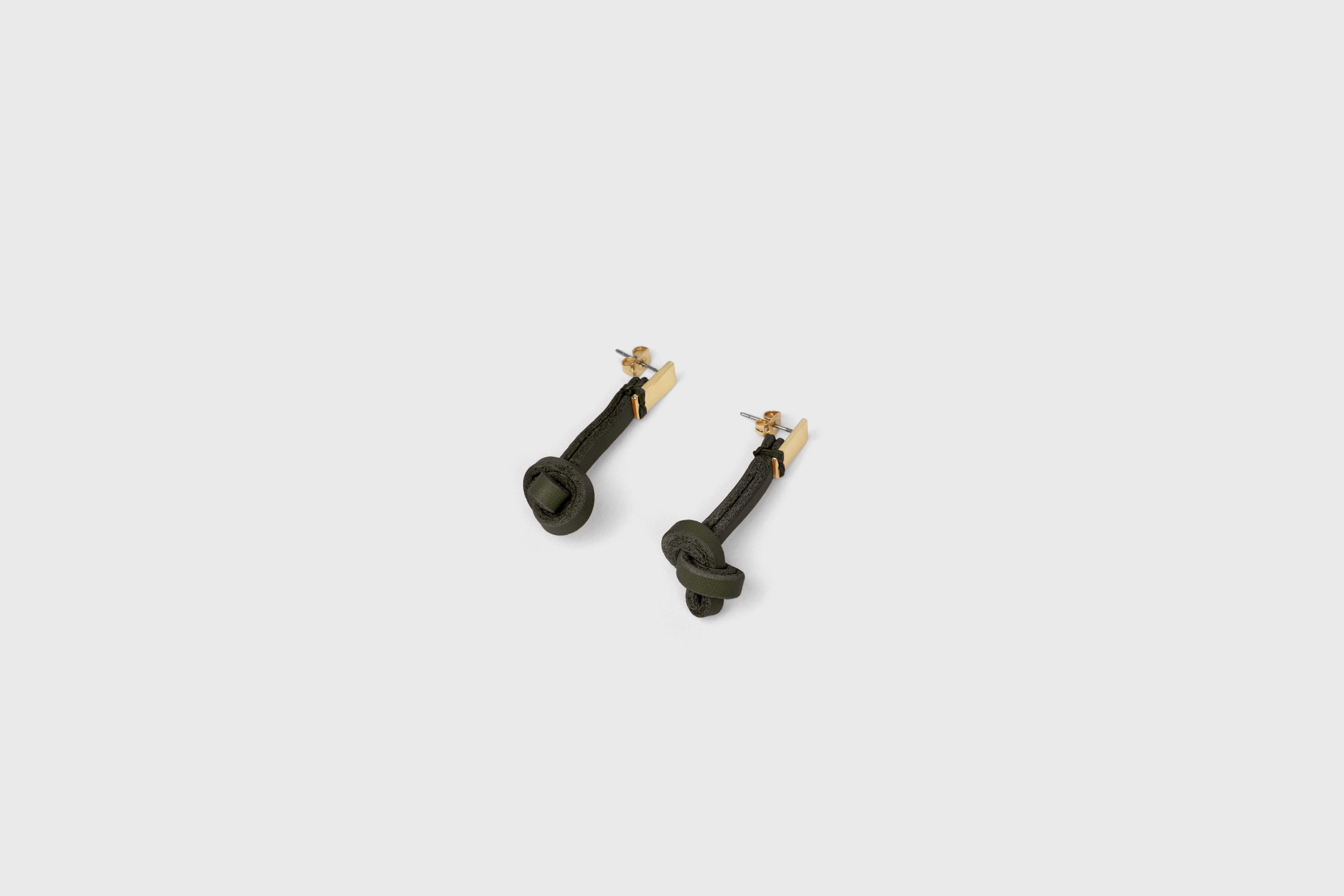 Gaia Earrings In Olive Green Color In Vegetable Tanned Leather Minimalistic Design Atelier Madre Manuel Dreesmann Barcelona Spain