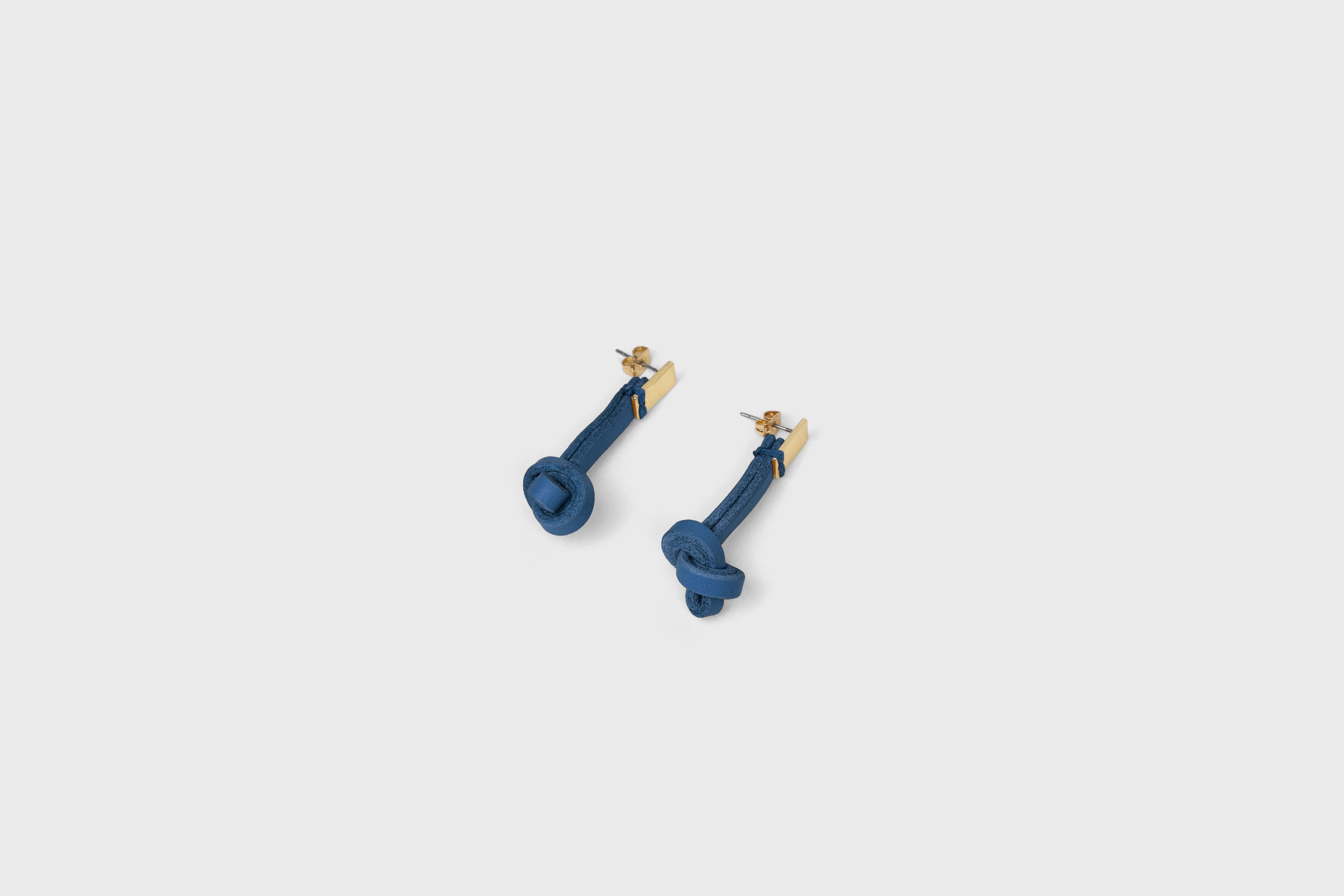 Gaia Earrings In Royal Blue Color In Vegetable Tanned Leather Minimalistic Design Atelier Madre Manuel Dreesmann Barcelona Spain