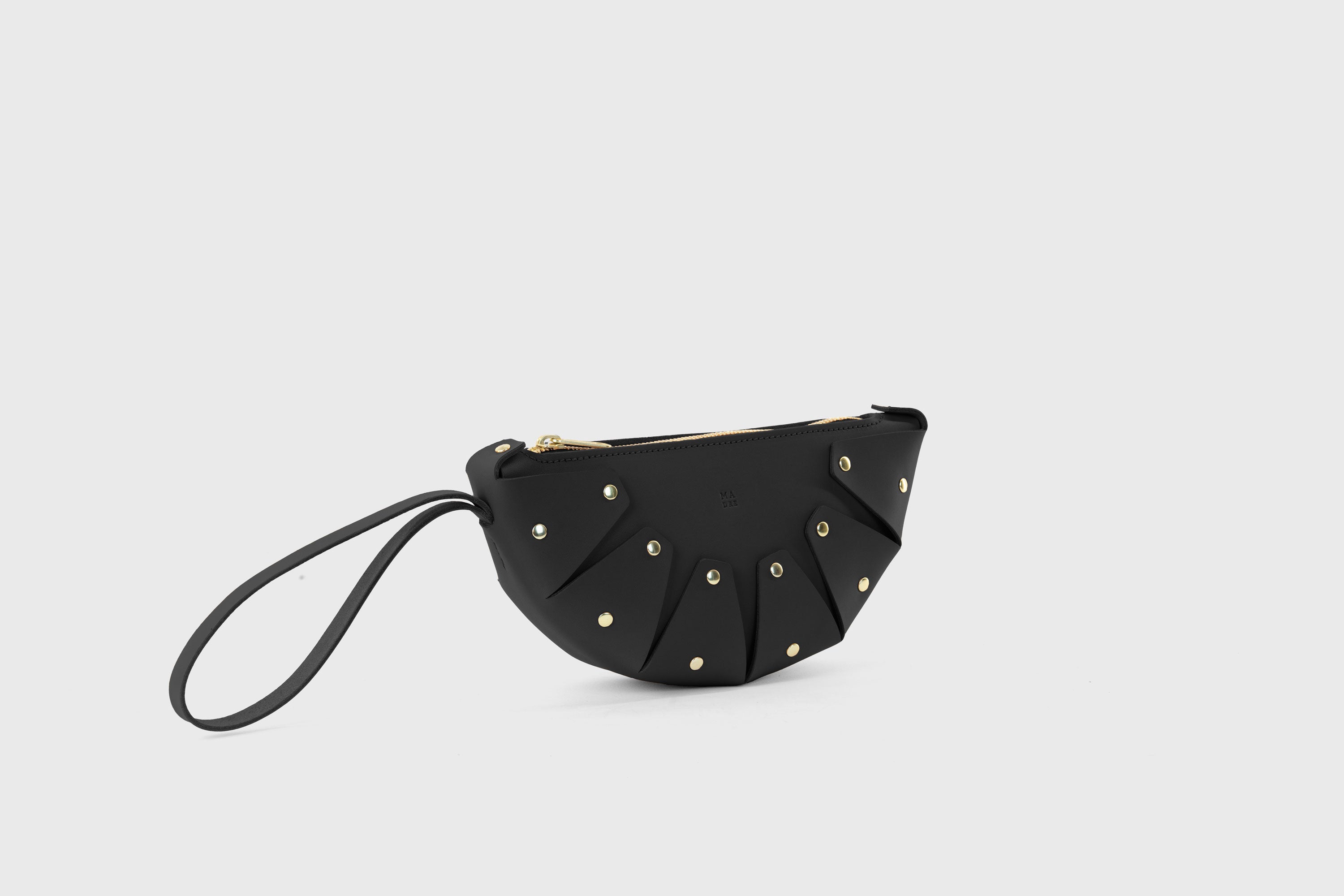 Juno Leather Bag Black Color Vegetable Tanned Full Grain Spain Brass Rivets Design Minimalist Half Moon Circle Round Zipper Pouch Handbag Clutch Bag Atelier Madre Manuel Dreesmann Barcelona