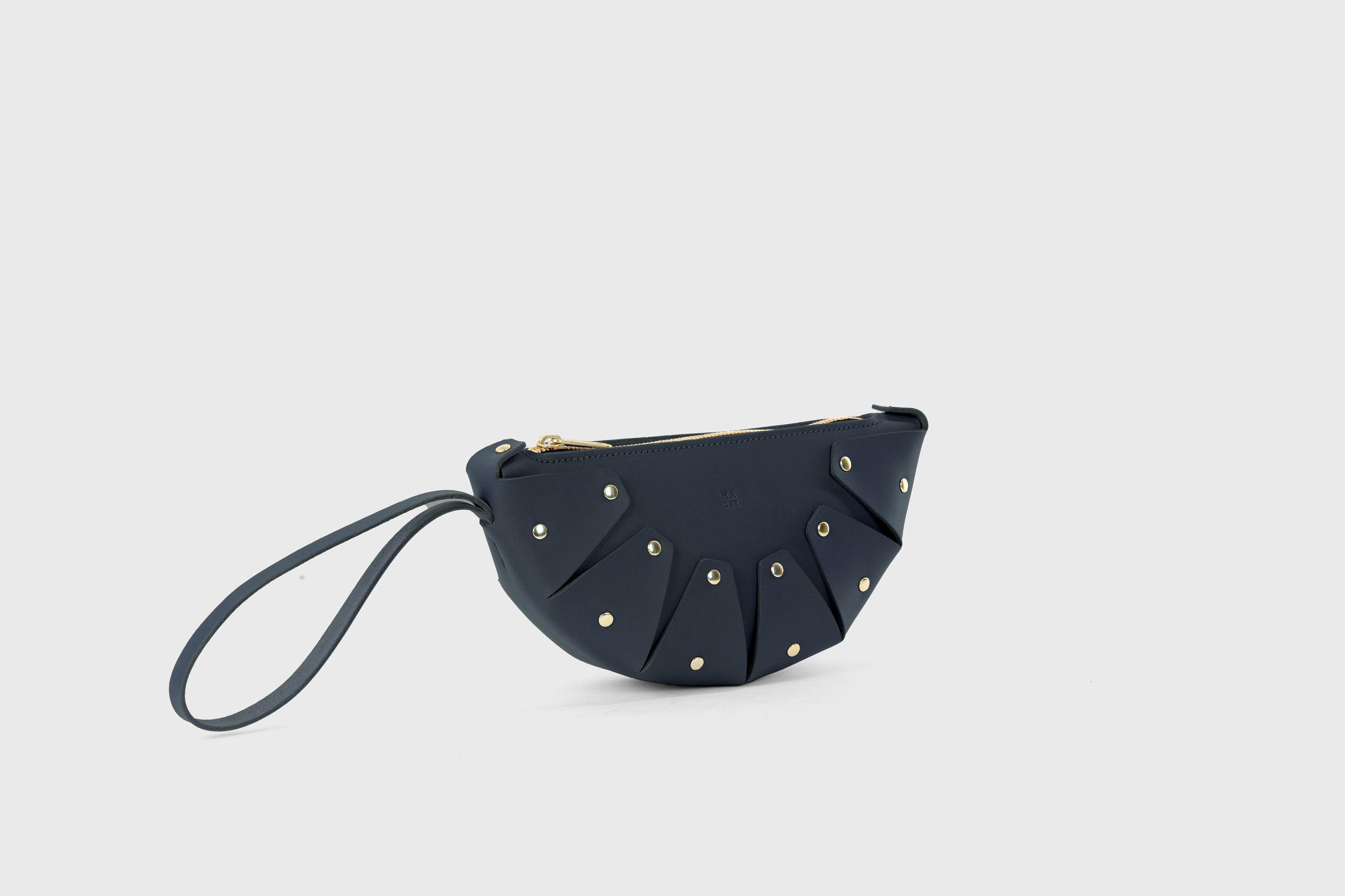 Juno Leather Bag Marine Blue Color Vegetable Tanned Full Grain Spain Brass Rivets Design Minimalist Half Moon Circle Round Zipper Pouch Handbag Clutch Bag Atelier Madre Manuel Dreesmann Barcelona