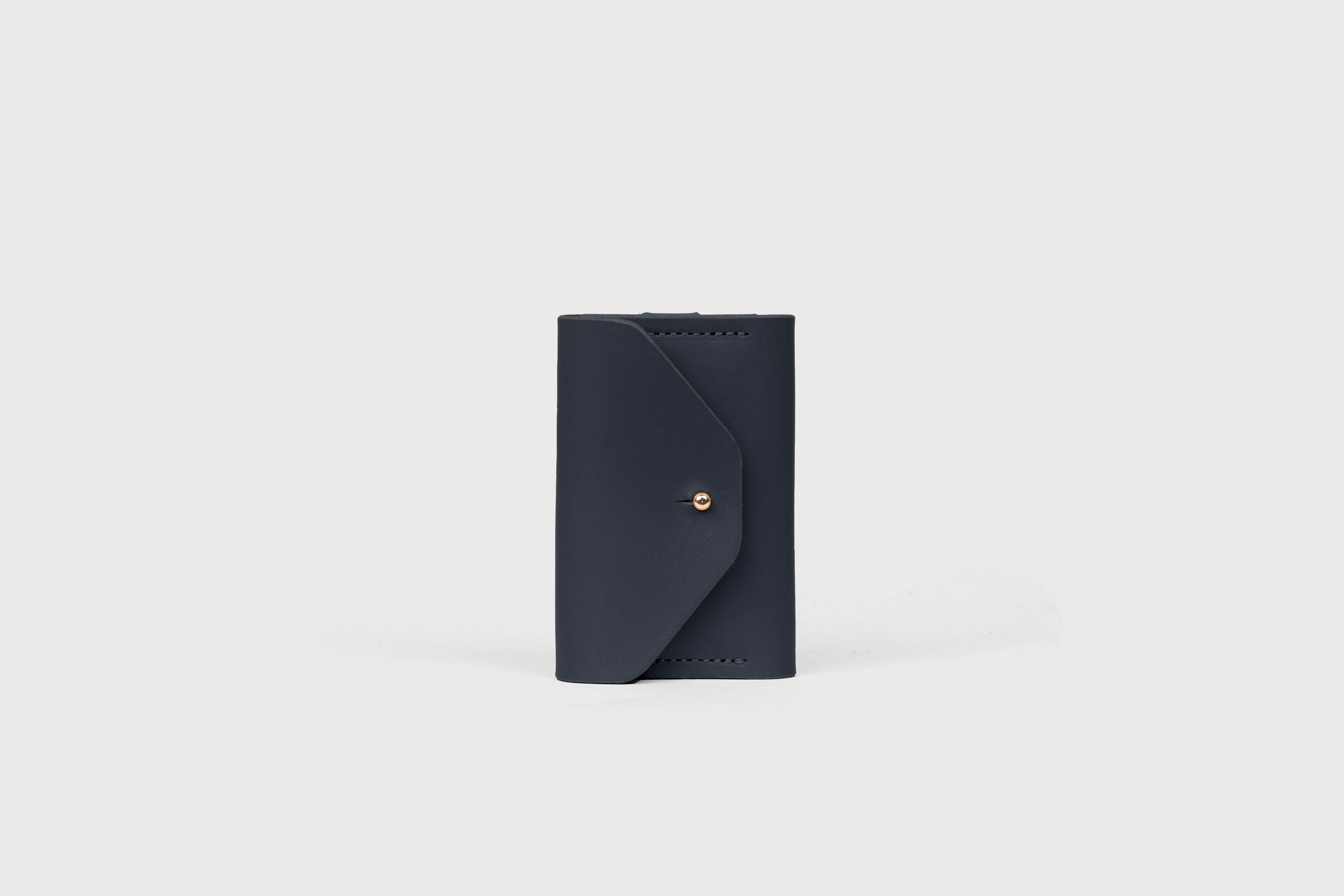 Key and Card Wallet In Marine Blue Color In Vegetable Tanned Leather Minimalistic Design Atelier Madre Manuel Dreesmann Barcelona Spain