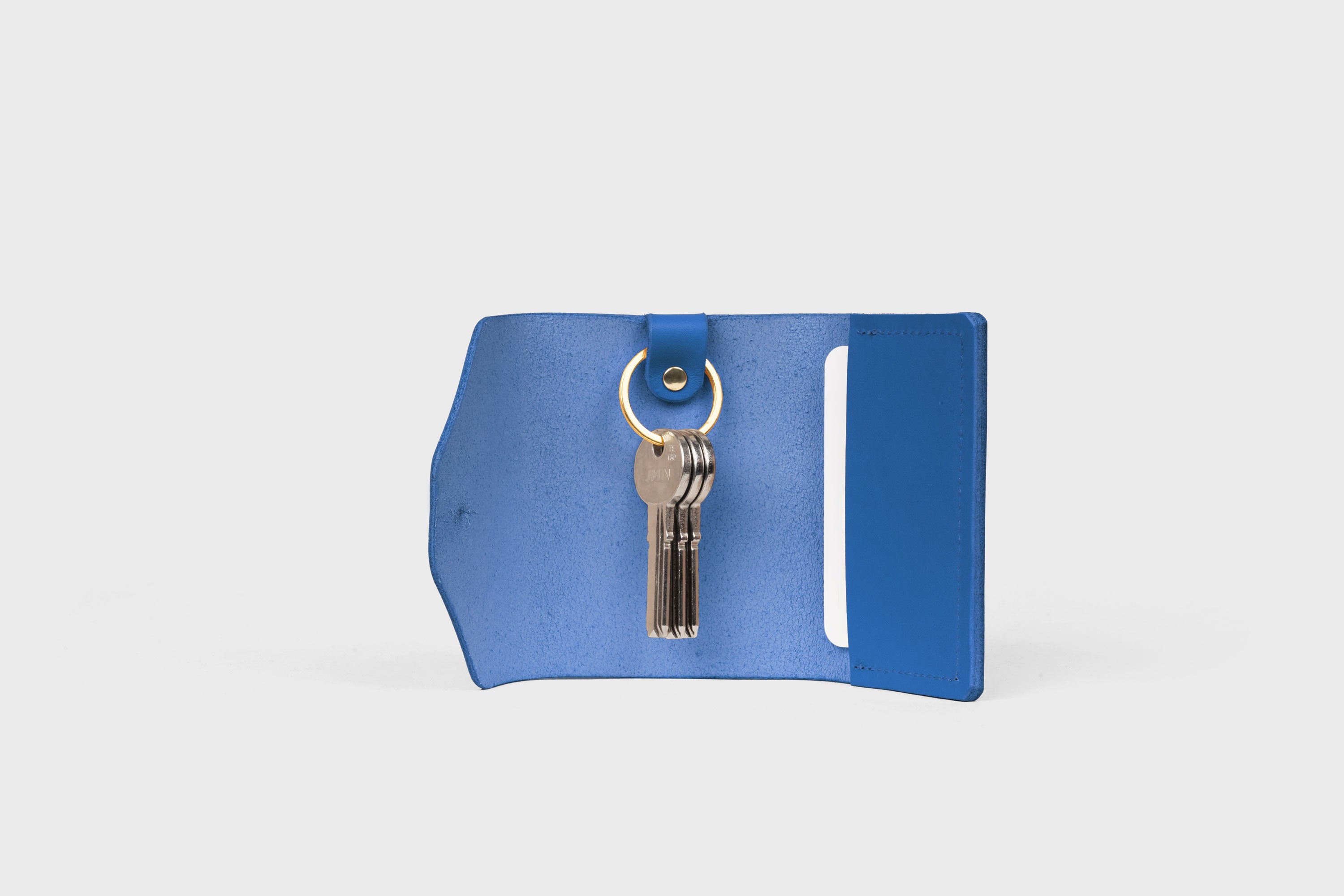 Key and Card Wallet In Royal Blue Color In Vegetable Tanned Leather Minimalistic Design Atelier Madre Manuel Dreesmann Barcelona Spain