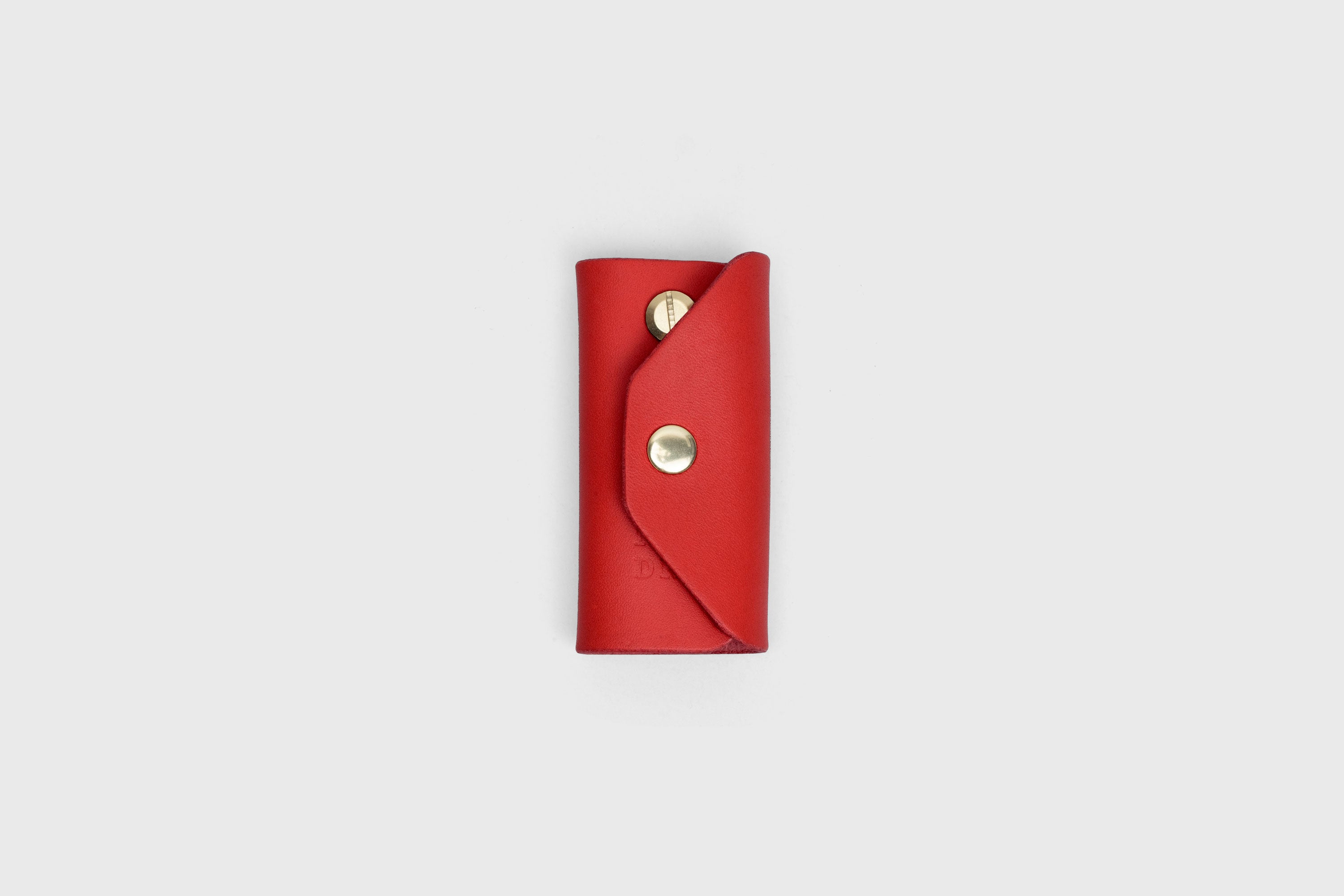 Key Etui In Red Color In Vegetable Tanned Leather Key Holder With Snap Button Minimalistic Design Atelier Madre Manuel Dreesmann Barcelona Spain