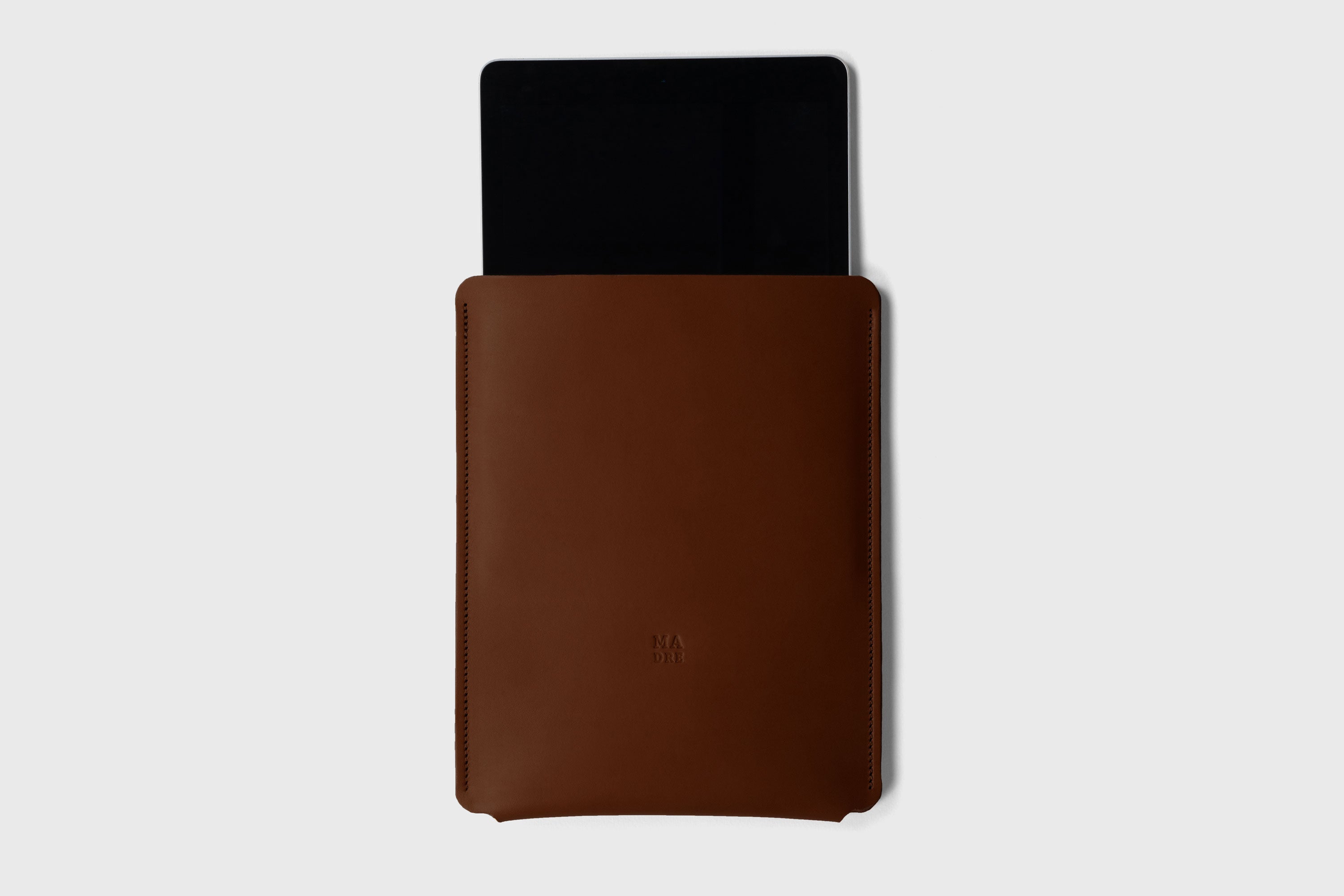 Leather Slip Sleeve For iPad Dark Brown Color Premium Handcrafted Quality Full Grain Vegetable Tanned Leather Minimalistic Modern Independent Designer Atelier Madre Manuel Dreesmann Barcelona Spain