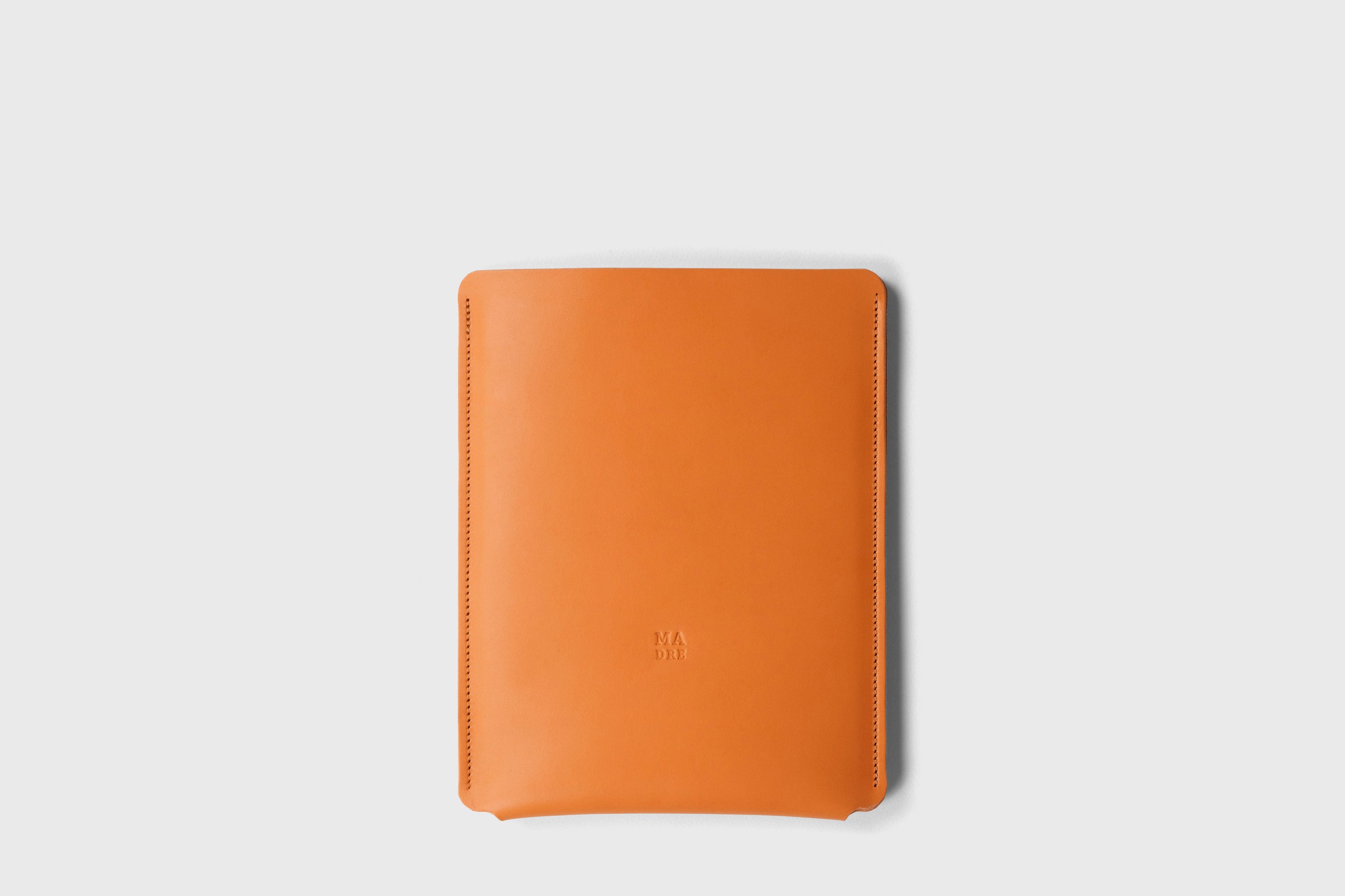Leather Slip Sleeve For iPad Orange Color Premium Handcrafted Quality Full Grain Vegetable Tanned Leather Minimalistic Modern Independent Designer Atelier Madre Manuel Dreesmann Barcelona Spain