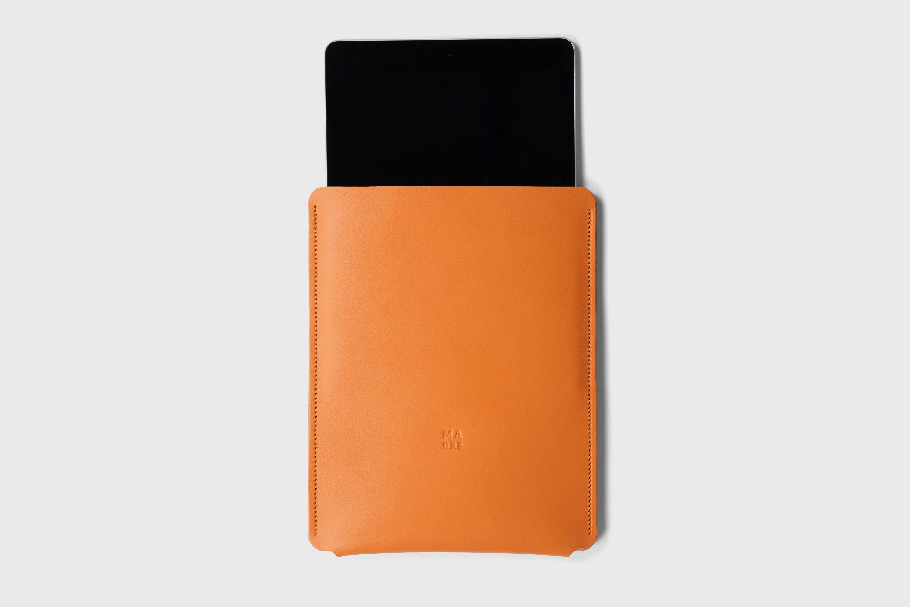Leather Slip Sleeve For iPad Orange Color Premium Handcrafted Quality Full Grain Vegetable Tanned Leather Minimalistic Modern Independent Designer Atelier Madre Manuel Dreesmann Barcelona Spain