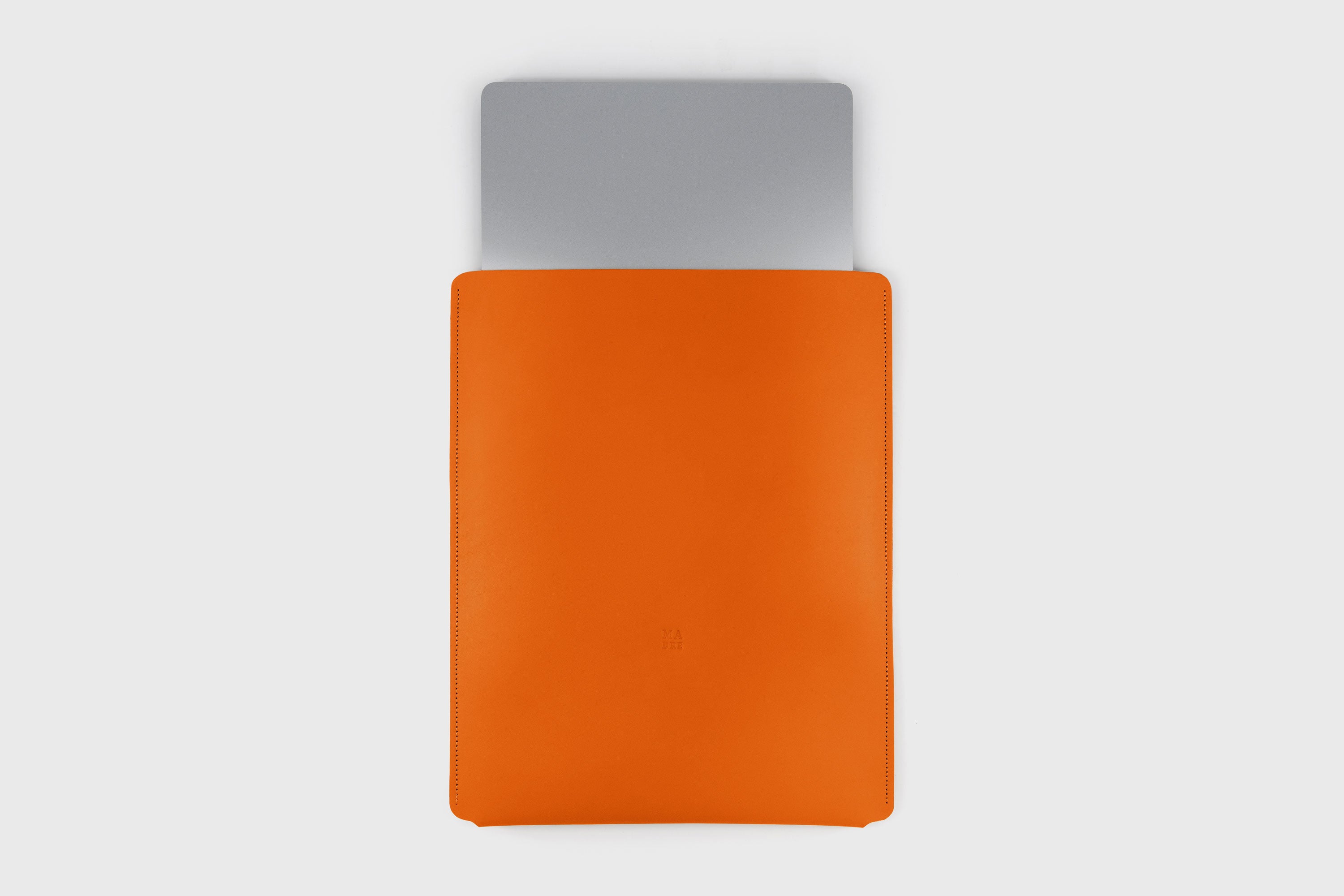 Leather Slip Sleeve For MacBook Vertical Orange Color High Quality Full Grain Vegetable Tanned Leather Independent Modern Minimalist Designer Sleek Atelier Madre Manuel Dreesmann Barcelona Spain