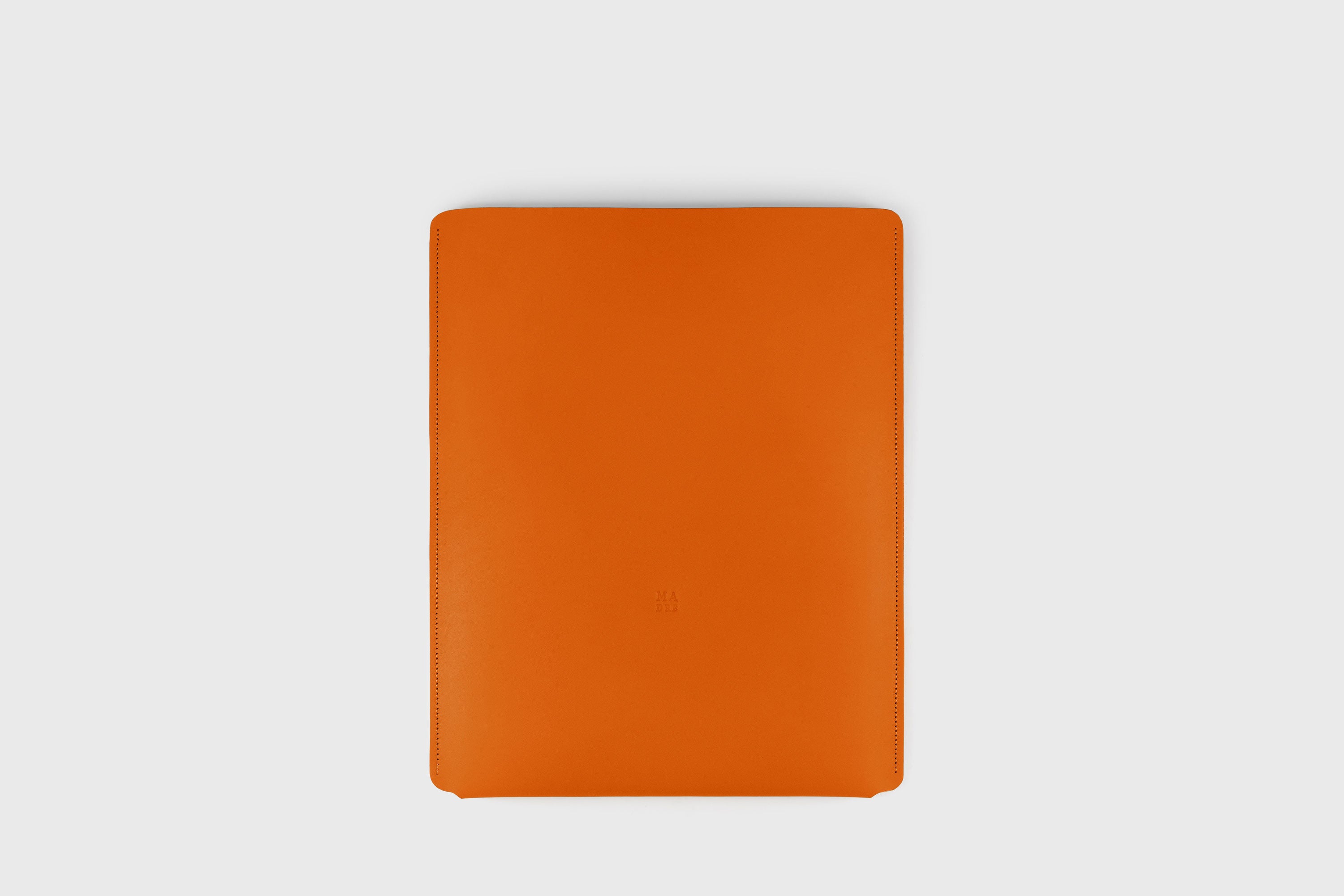 Leather Slip Sleeve For MacBook Vertical Orange Color High Quality Full Grain Vegetable Tanned Leather Independent Modern Minimalist Designer Sleek Atelier Madre Manuel Dreesmann Barcelona Spain