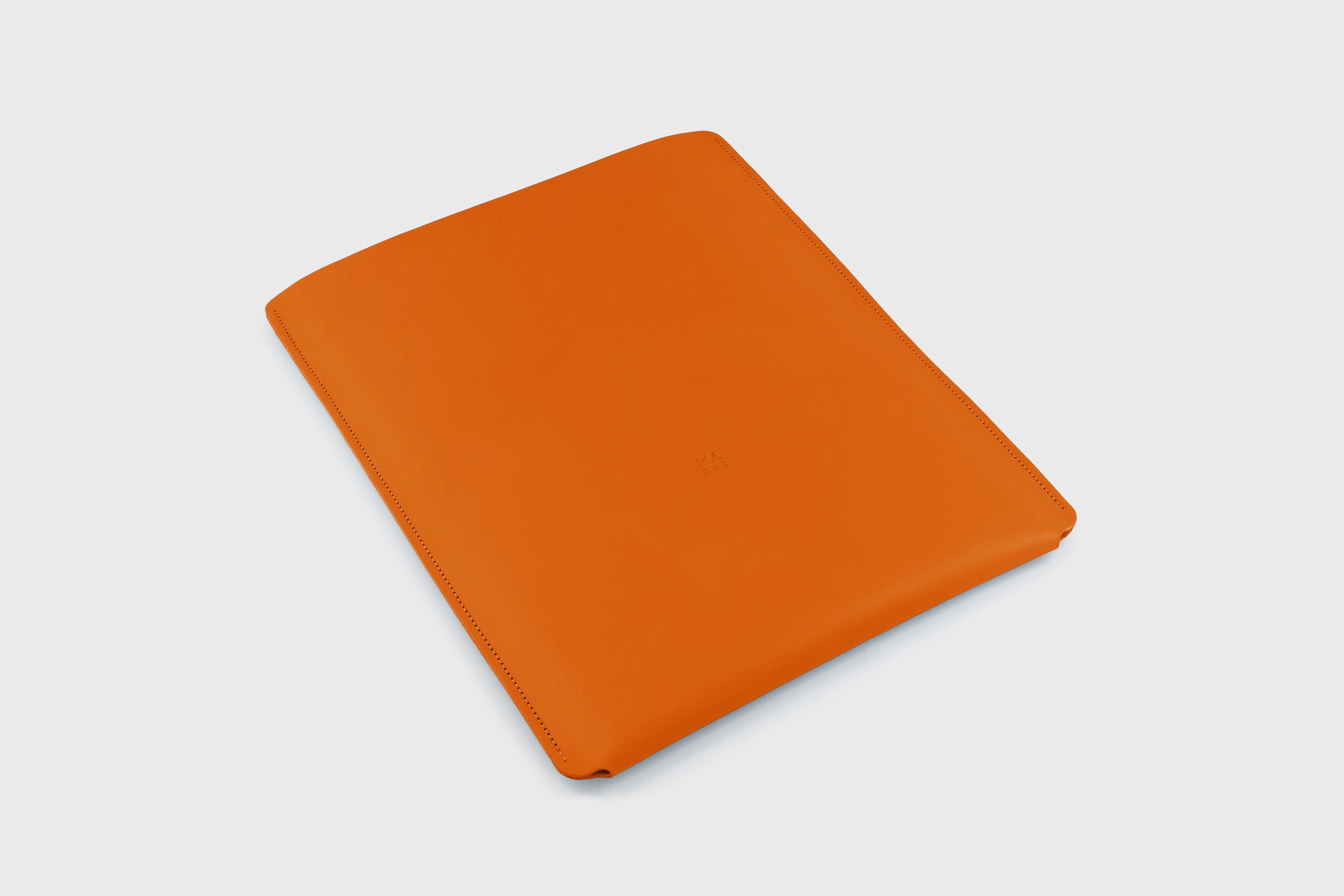 Leather Slip Sleeve For MacBook Vertical Orange Color High Quality Full Grain Vegetable Tanned Leather Independent Modern Minimalist Designer Sleek Atelier Madre Manuel Dreesmann Barcelona Spain