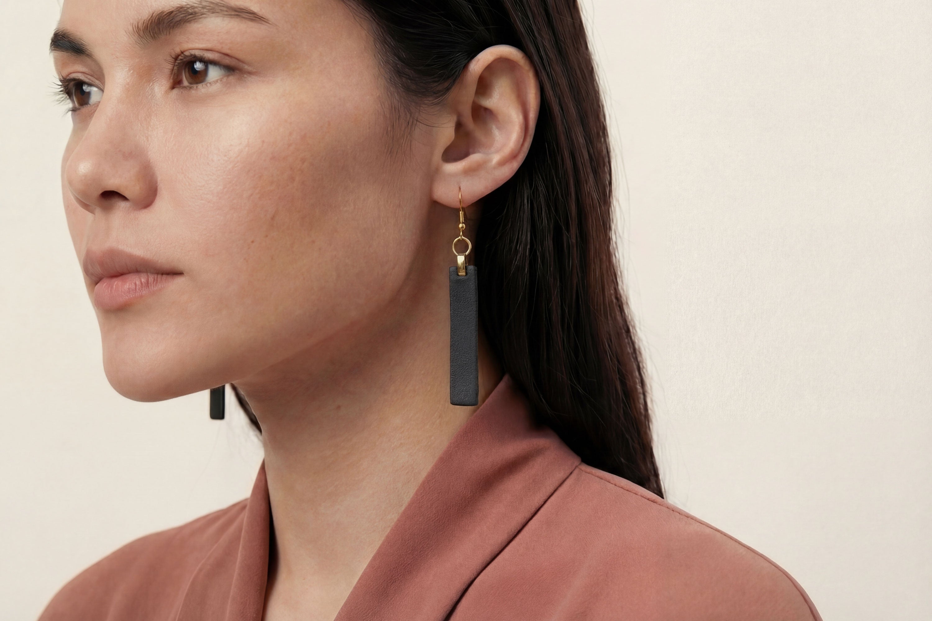 Lia Earrings Leather In Black Color On Model Vegetable Tanned Leather Atelier Madre Manuel Dreesmann Barcelona Spain