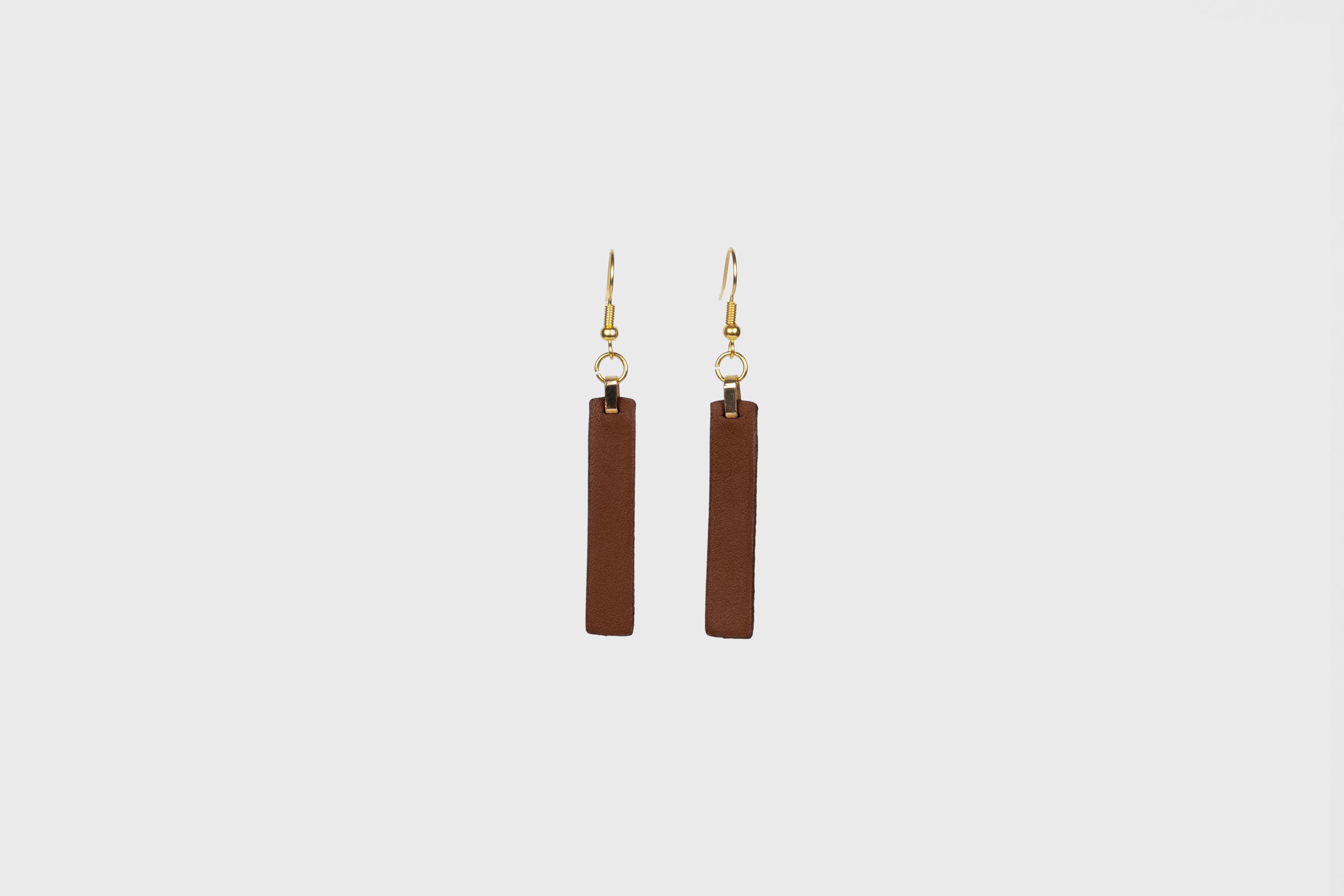 Lia Earrings Leather In Dark Brown Color Vegetable Tanned Leather Atelier Madre Manuel Dreesmann Barcelona Spain