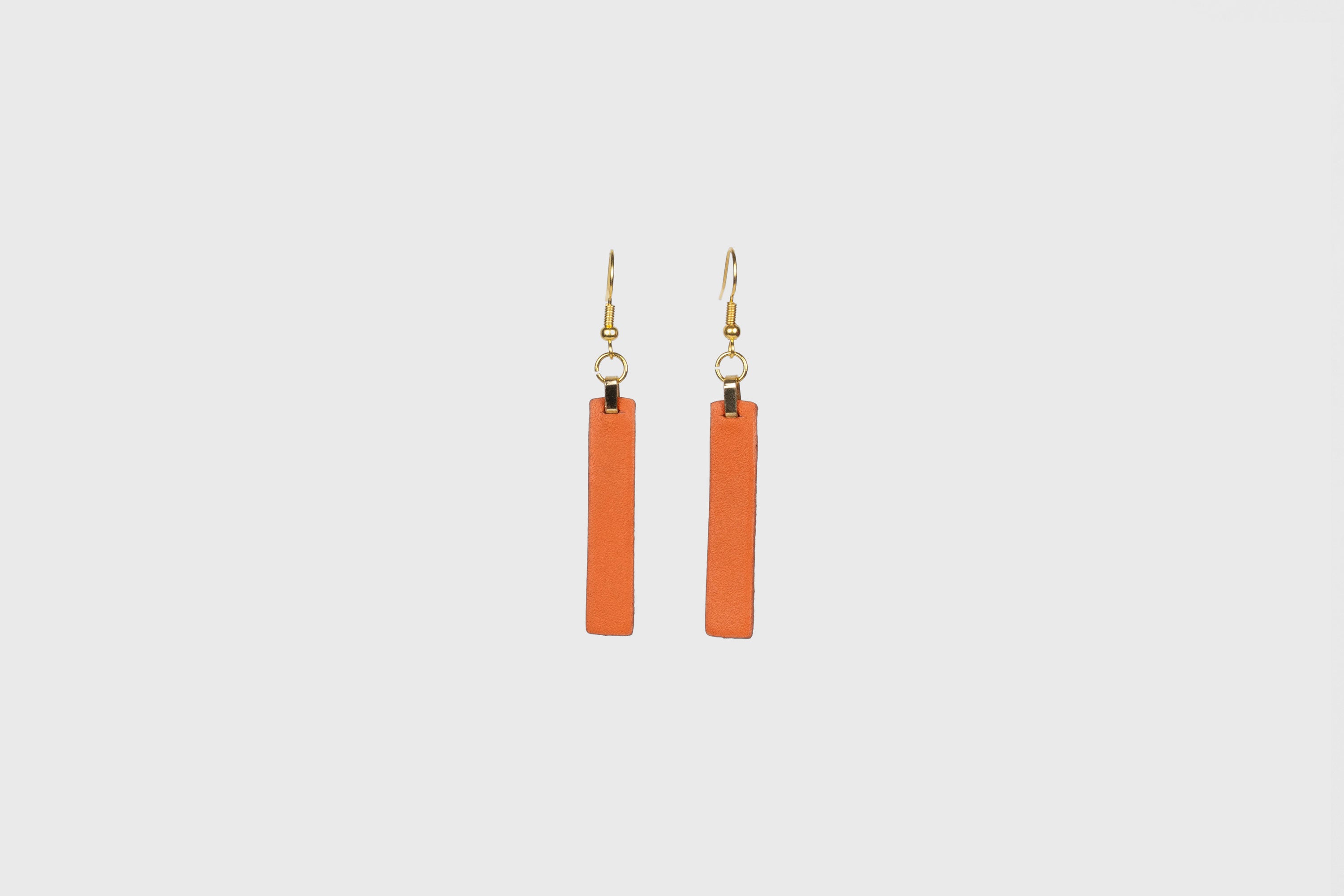 Lia Earrings Leather In Orange Color Vegetable Tanned Leather Atelier Madre Manuel Dreesmann Barcelona Spain