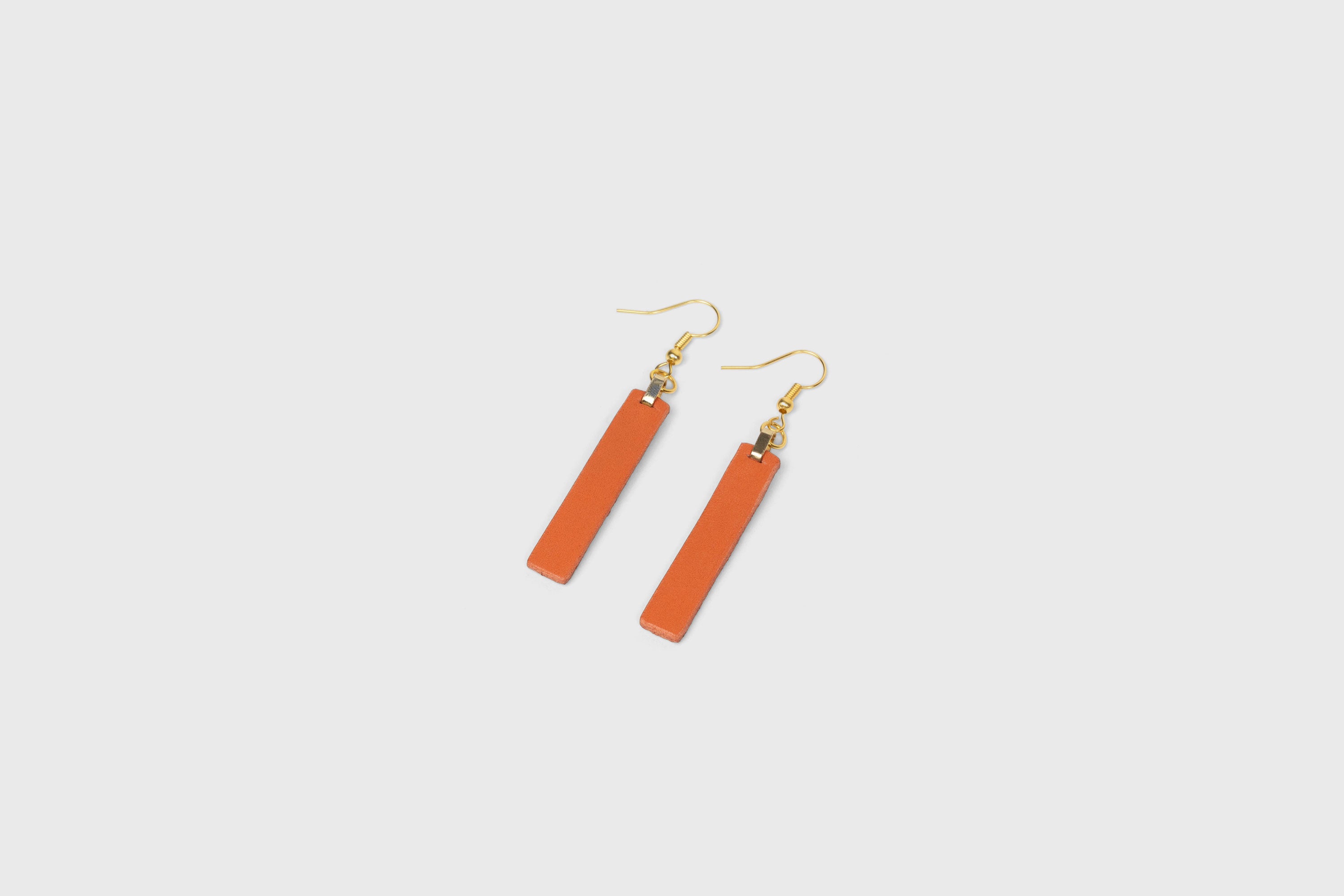 Lia Earrings Leather In Orange Color Vegetable Tanned Leather Atelier Madre Manuel Dreesmann Barcelona Spain