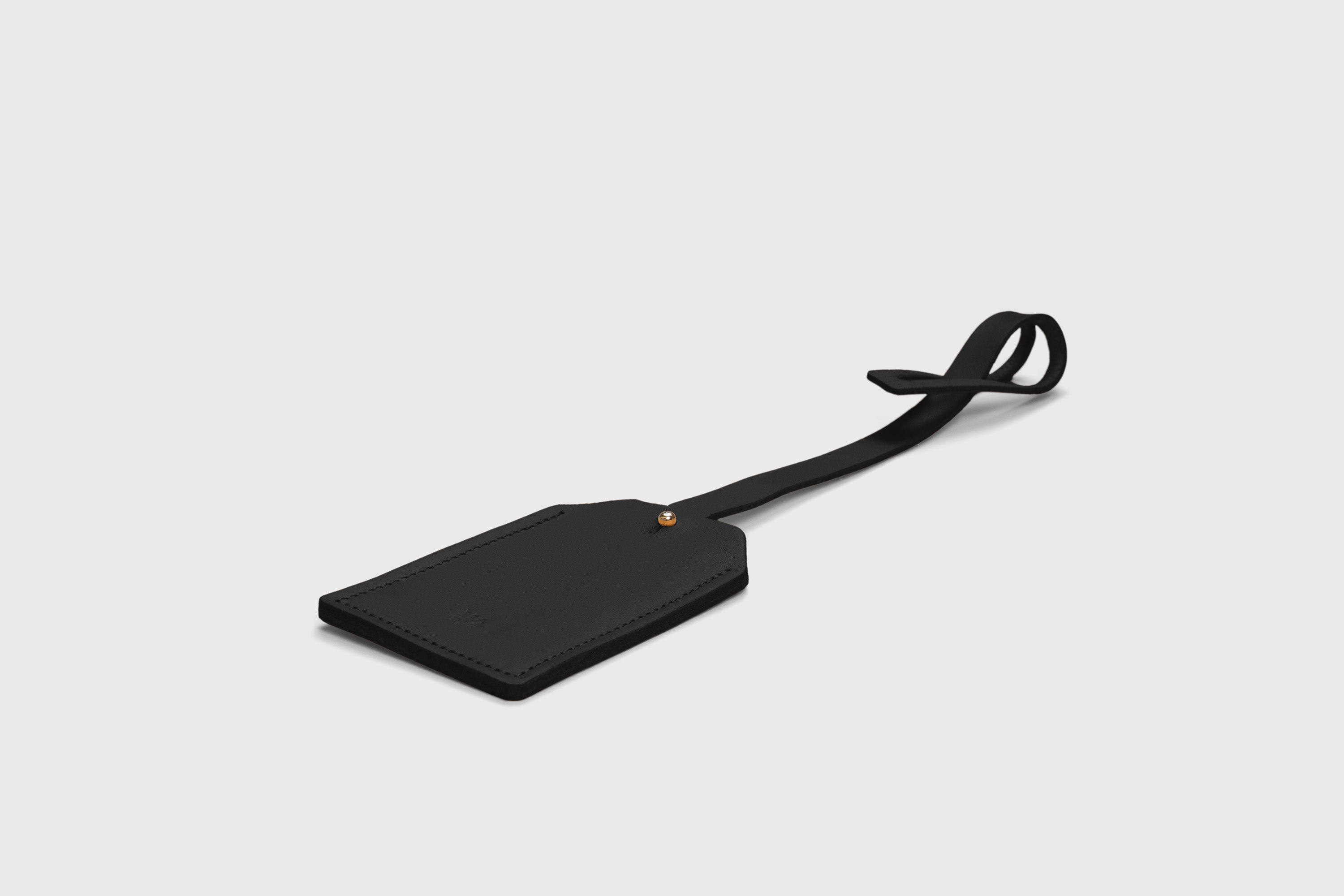 Luggage Tag Holder Leather Black Color Premium Quality Minimalist Design Atelier Madre Manuel Dreesmann Barcelona Spain