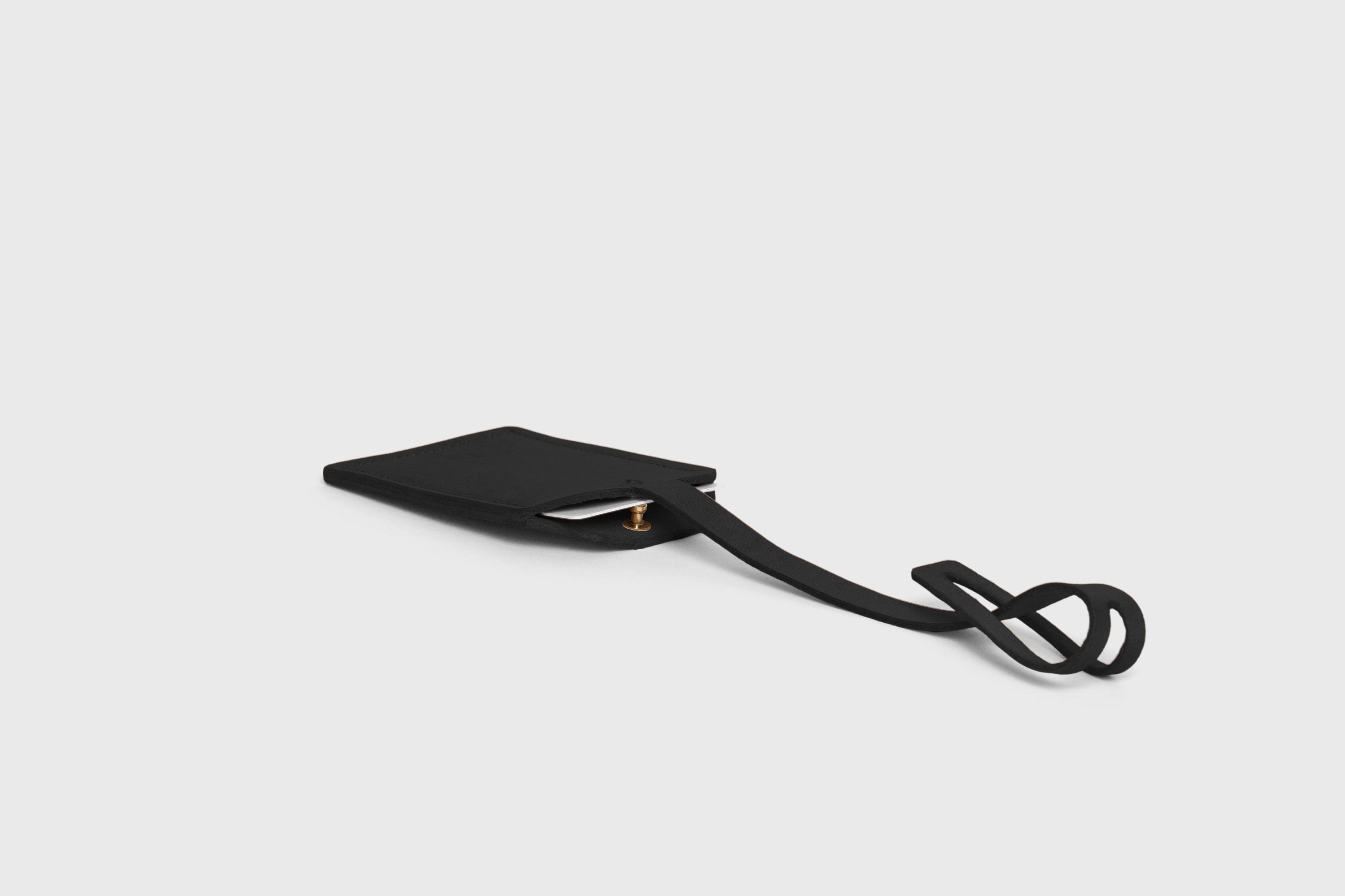 Luggage Tag Holder Leather Black Color Premium Quality Minimalist Design Atelier Madre Manuel Dreesmann Barcelona Spain