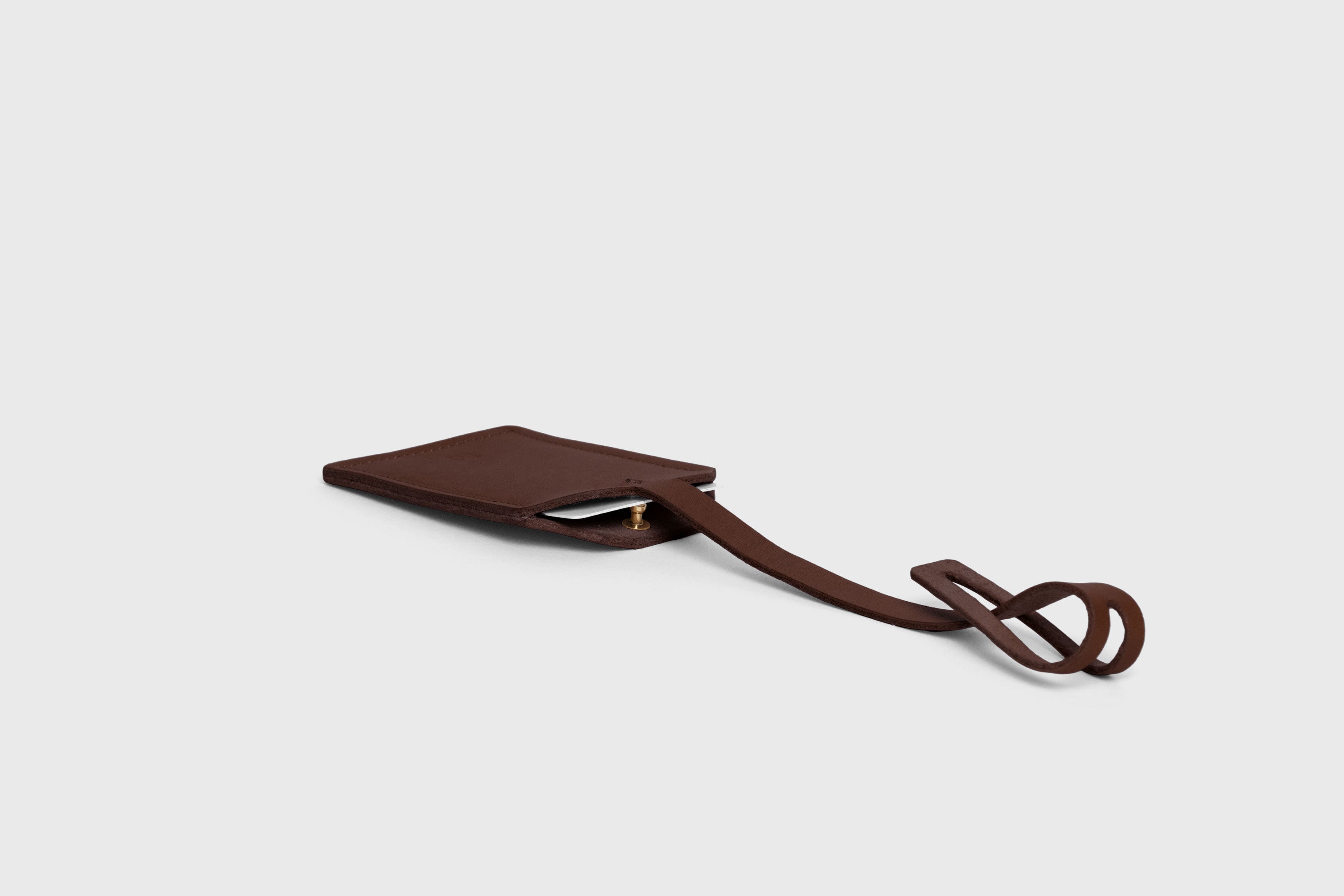 Luggage Tag Holder Leather Dark Brown Color Premium Quality Minimalist Design Atelier Madre Manuel Dreesmann Barcelona Spain