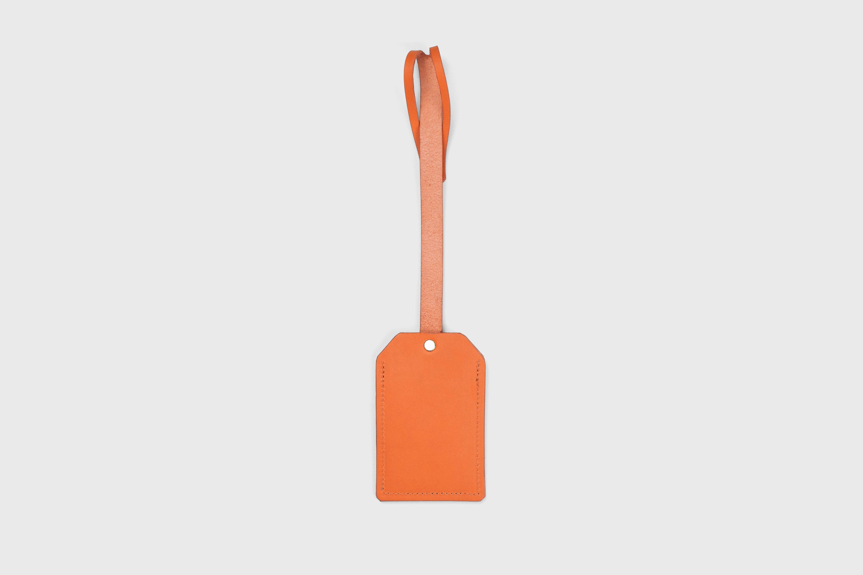 Luggage Tag Holder Leather Orange Color Premium Quality Minimalist Design Atelier Madre Manuel Dreesmann Barcelona Spain