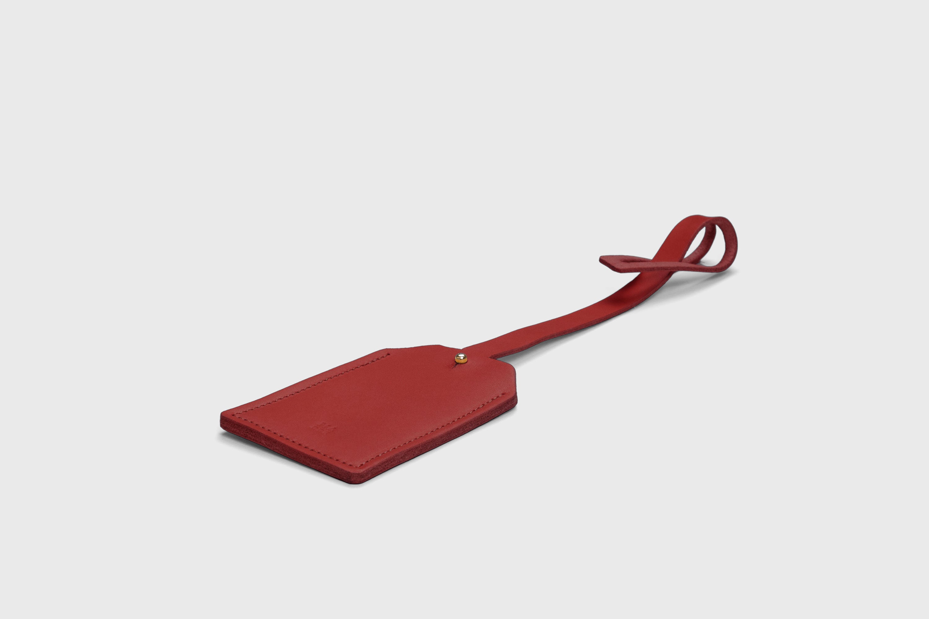 Luggage Tag Holder Leather Red Color Premium Quality Minimalist Design Atelier Madre Manuel Dreesmann Barcelona Spain