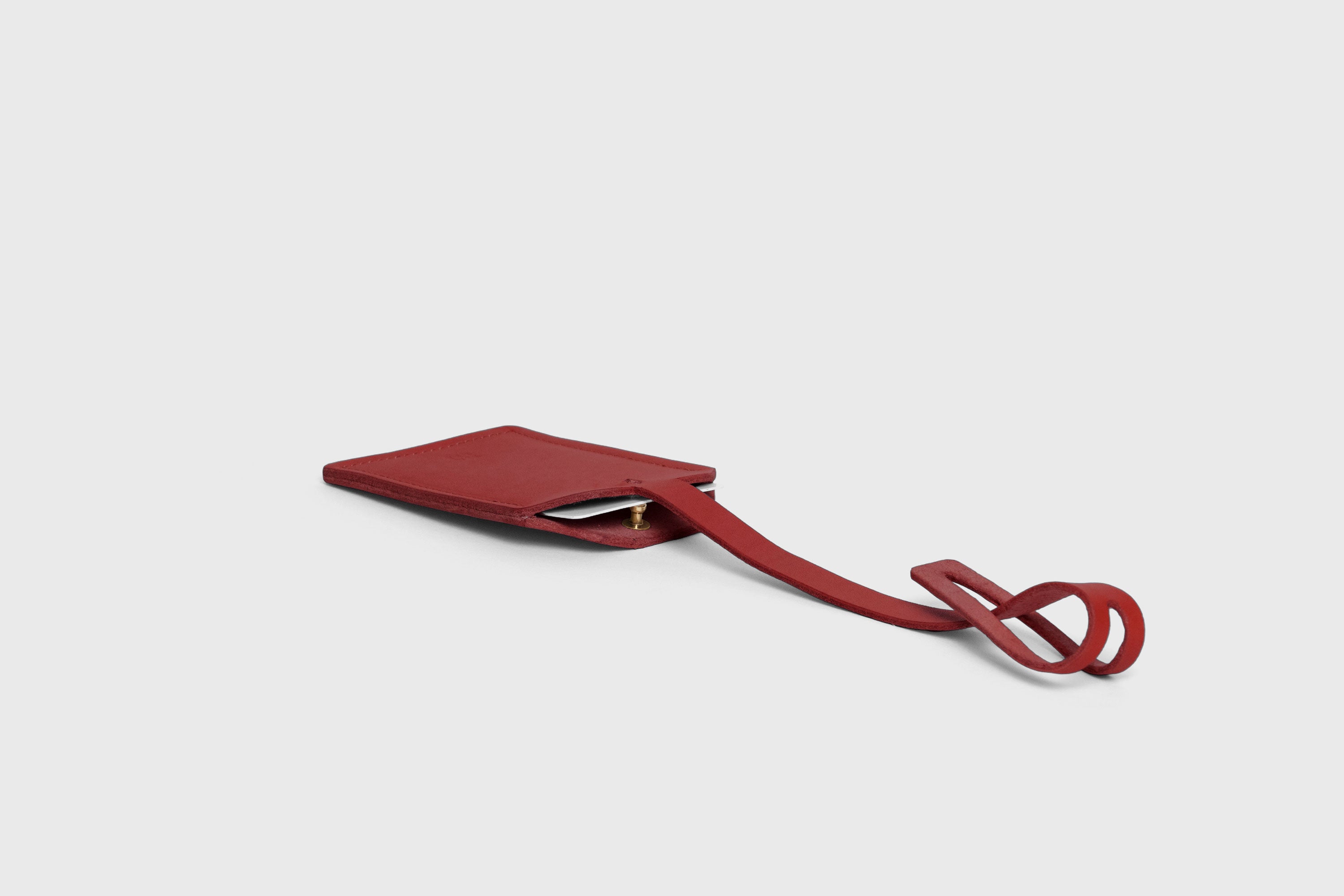 Luggage Tag Holder Leather Red Color Premium Quality Minimalist Design Atelier Madre Manuel Dreesmann Barcelona Spain