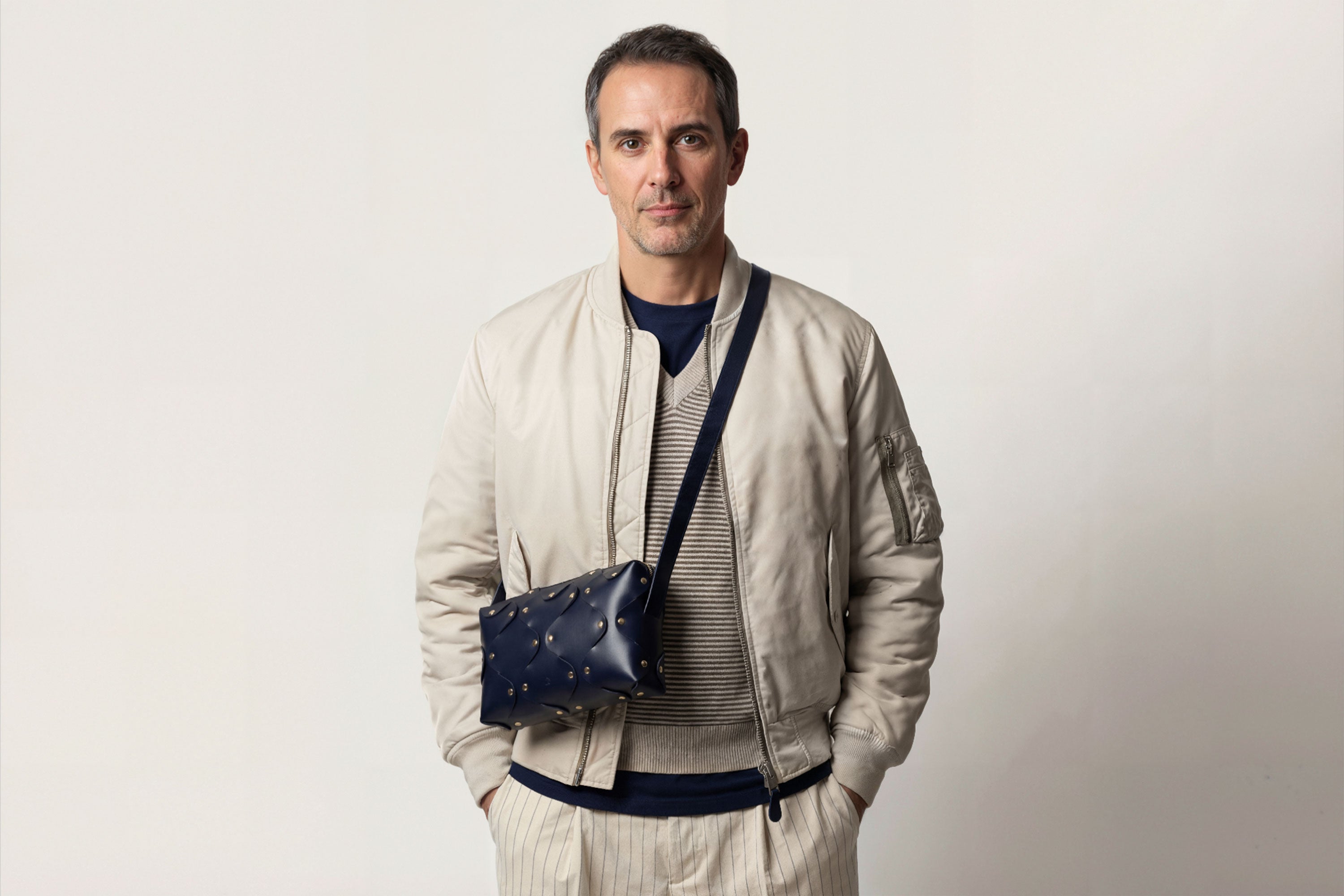 Marlin Leather Bag Marine Blue On A Man Model Quality Brass Rivet Designer Minimal Square Zipper Pouch Crossbody Handbag Clutch Shoulder Atelier Madre Manuel Dreesmann Barcelona