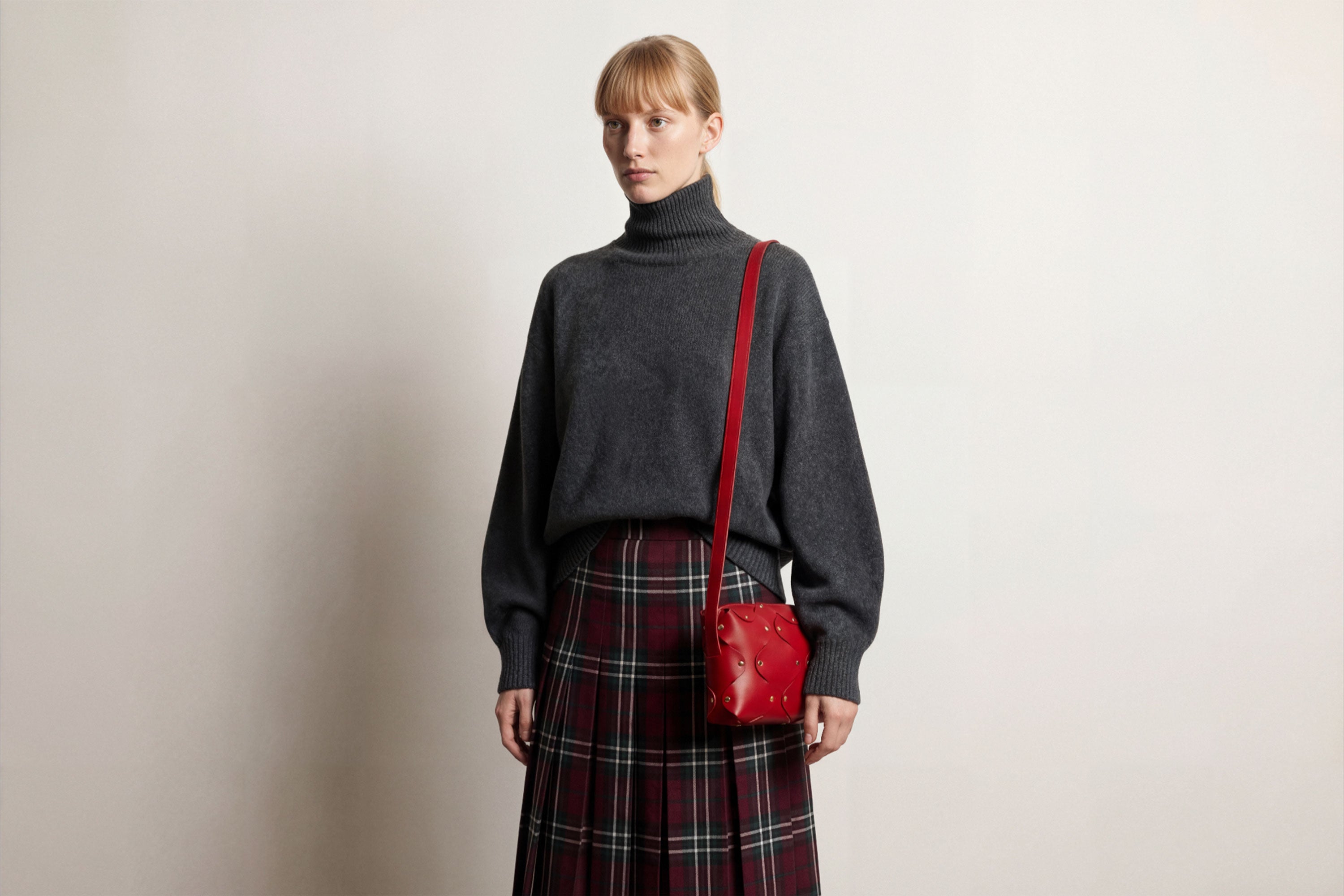 Marlin Leather Bag Red On A Woman Model Quality Brass Rivet Designer Minimal Square Zipper Pouch Crossbody Handbag Clutch Shoulder Atelier Madre Manuel Dreesmann Barcelona