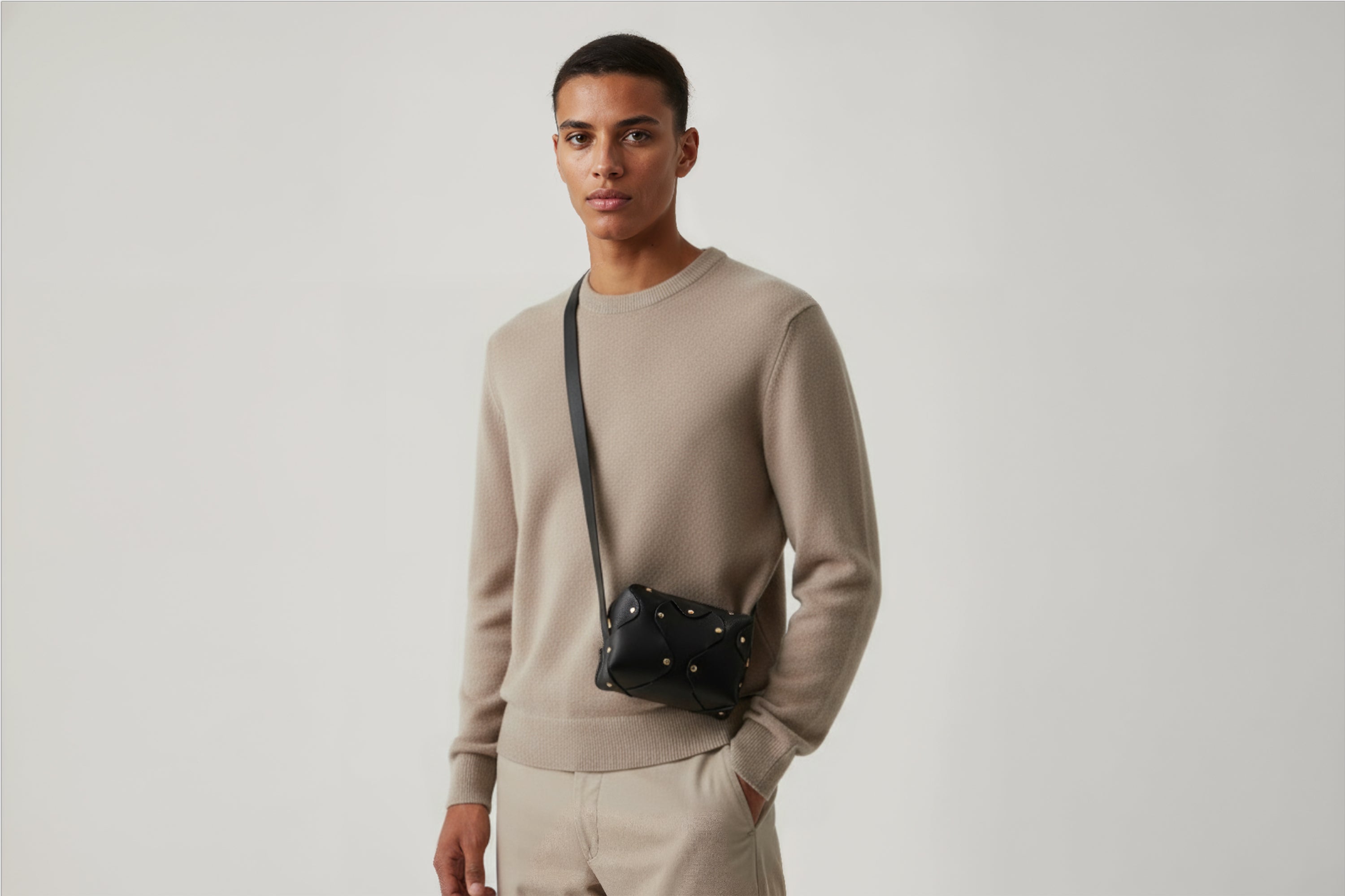 Marlin Leather Bag Small Black Color On A Man Model Premium Quality Minimalist Design Atelier Madre Manuel Dreesmann Barcelona Spain