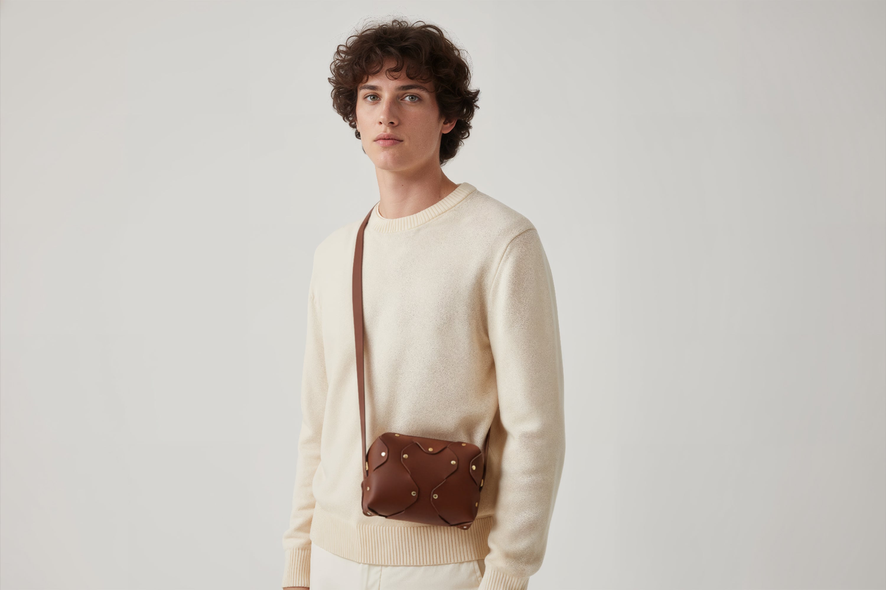 Marlin Leather Bag Small Dark Brown Color On A Man Model Premium Quality Minimalist Design Atelier Madre Manuel Dreesmann Barcelona Spain