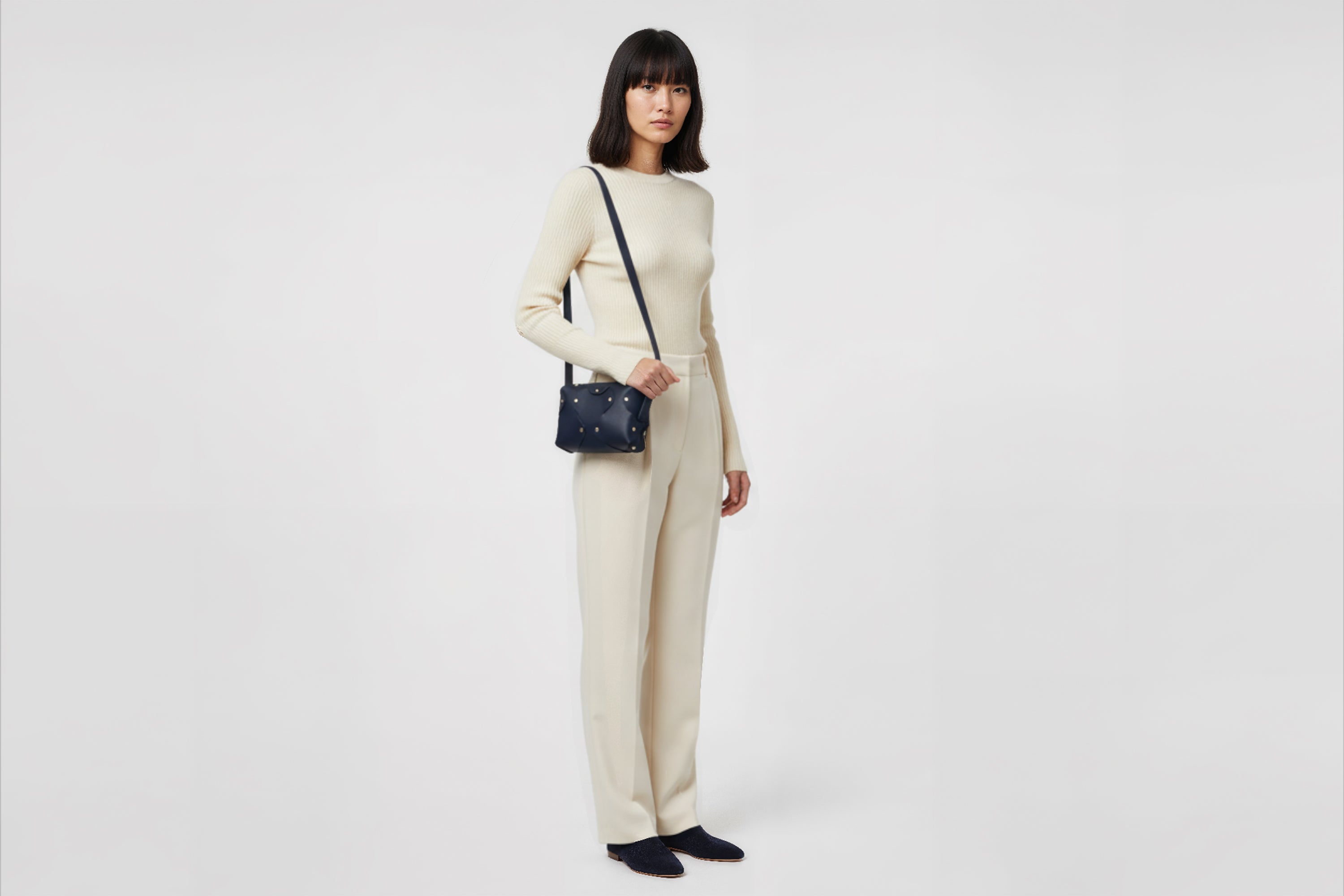 Marlin Leather Bag Small Marine Blue Color On A Woman Model Premium Quality Minimalist Design Atelier Madre Manuel Dreesmann Barcelona Spain