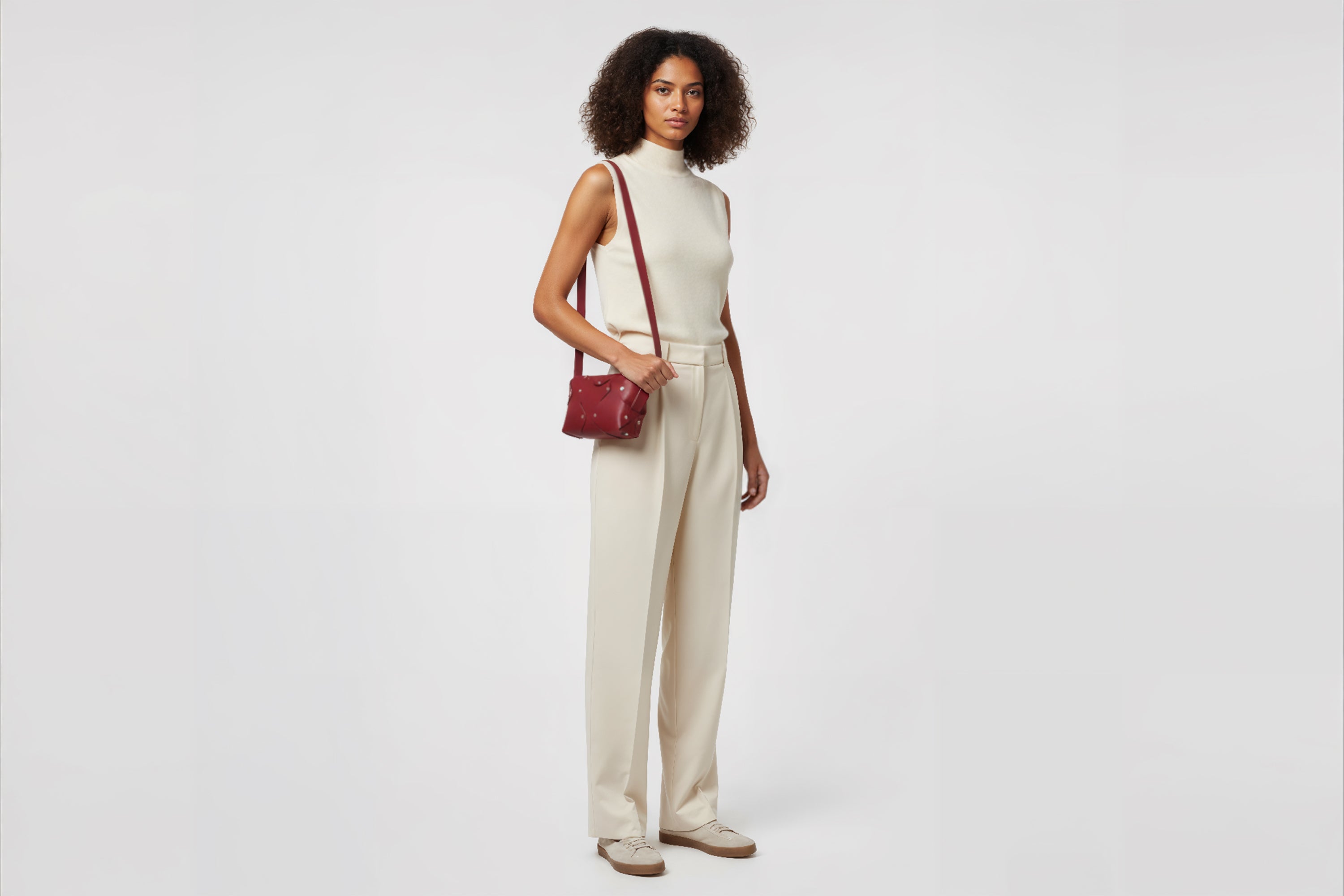 Marlin Leather Bag Small Red Color On A Woman Model Premium Quality Minimalist Design Atelier Madre Manuel Dreesmann Barcelona Spain