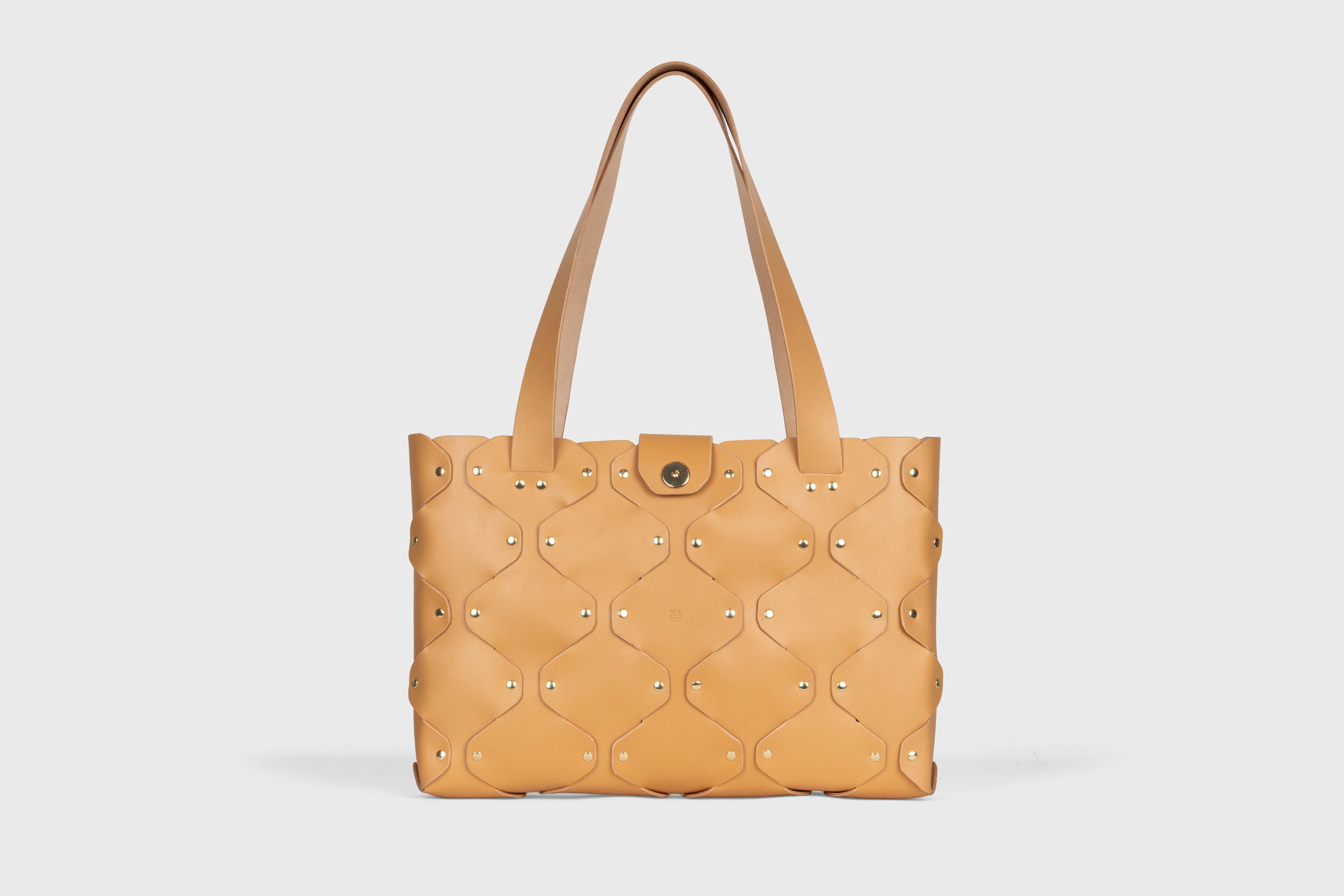 Marlin Tote Bag In Brown Color In Vegetable Tanned Leather With Rivets Atelier Madre Manuel Dreesmann Barcelona Spain