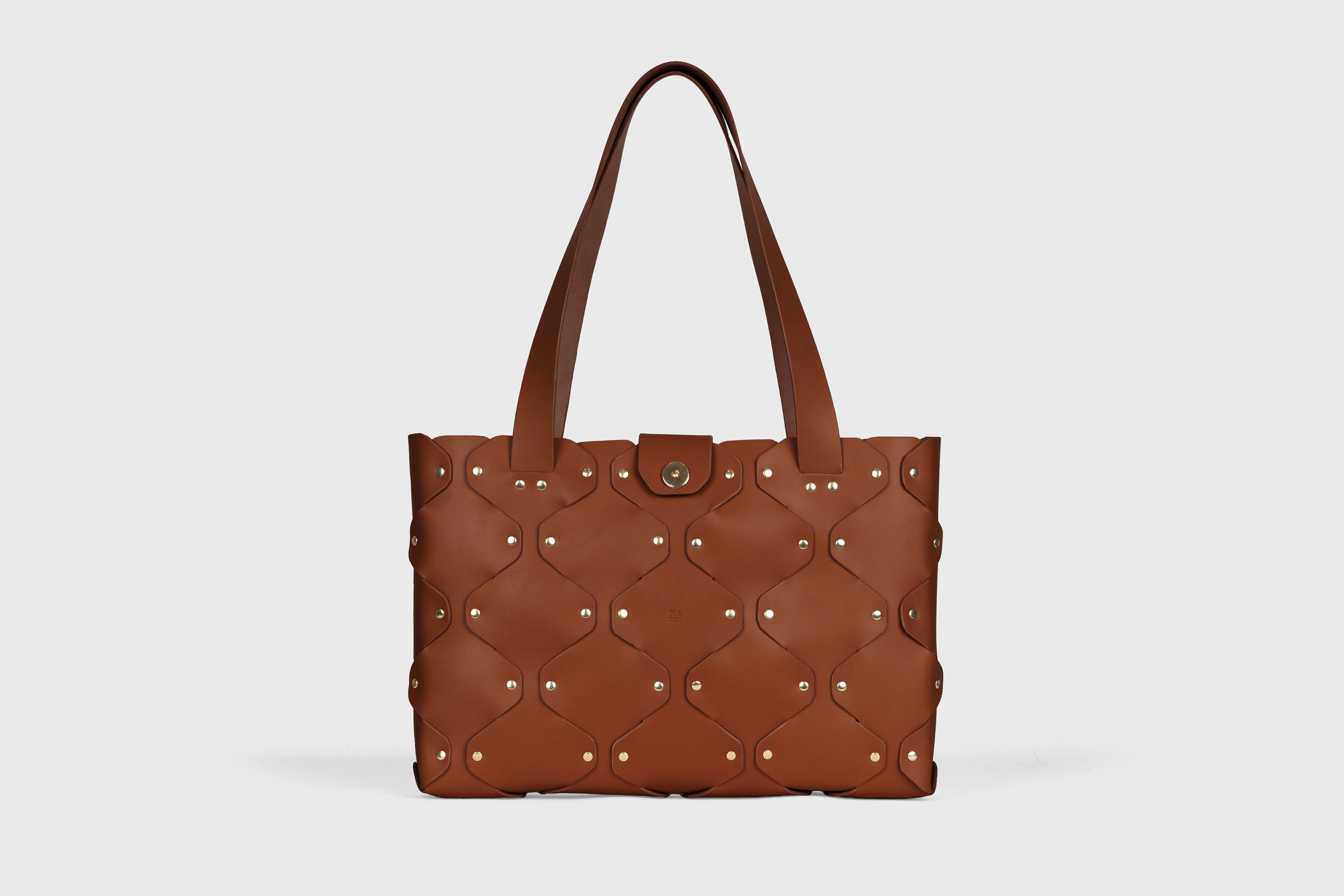 Marlin Tote Bag In Dark Brown Color In Vegetable Tanned Leather With Rivets Atelier Madre Manuel Dreesmann Barcelona Spain