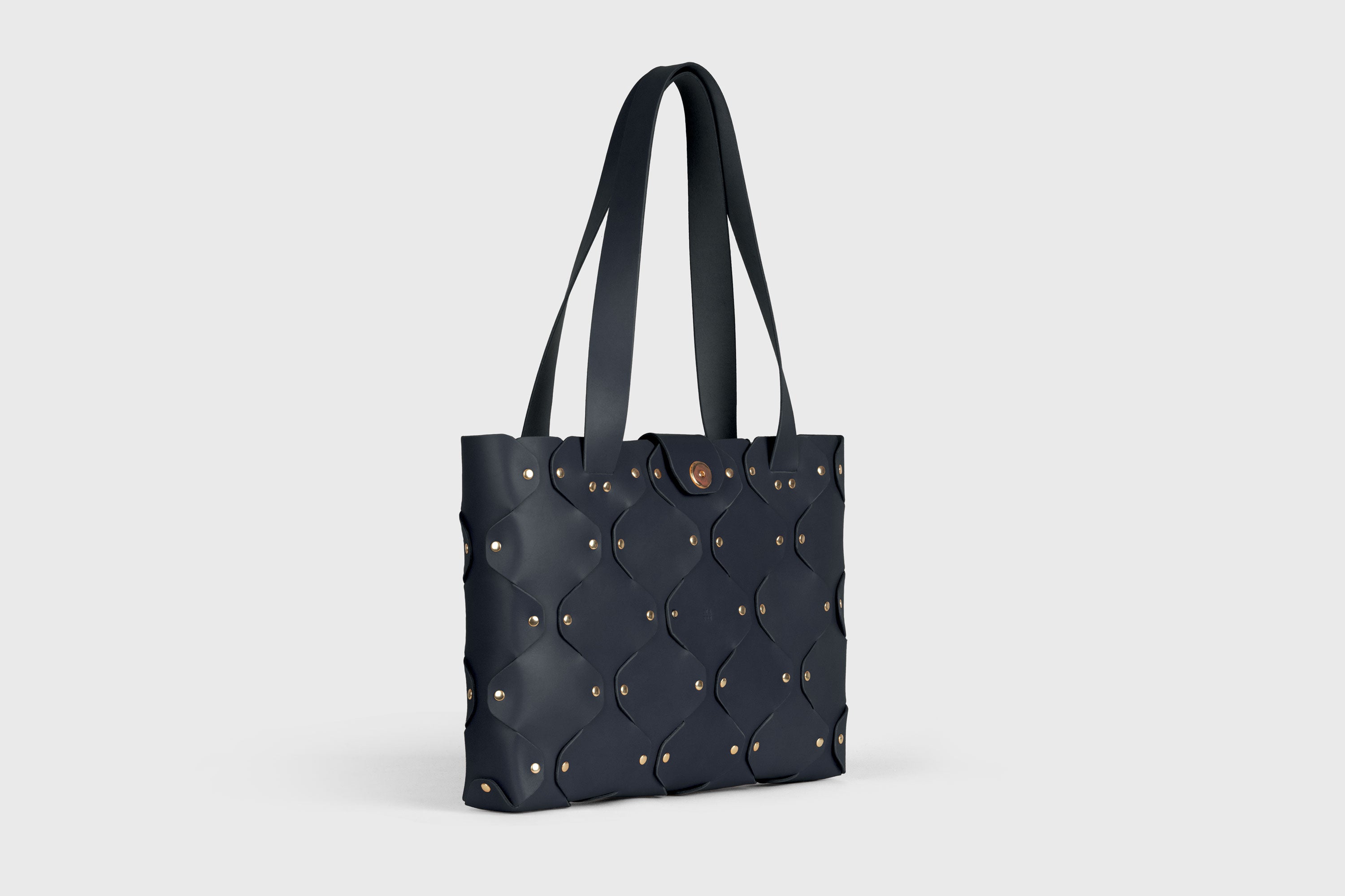 Marlin Tote Bag In Marine Blue Color In Vegetable Tanned Leather With Rivets Atelier Madre Manuel Dreesmann Barcelona Spain