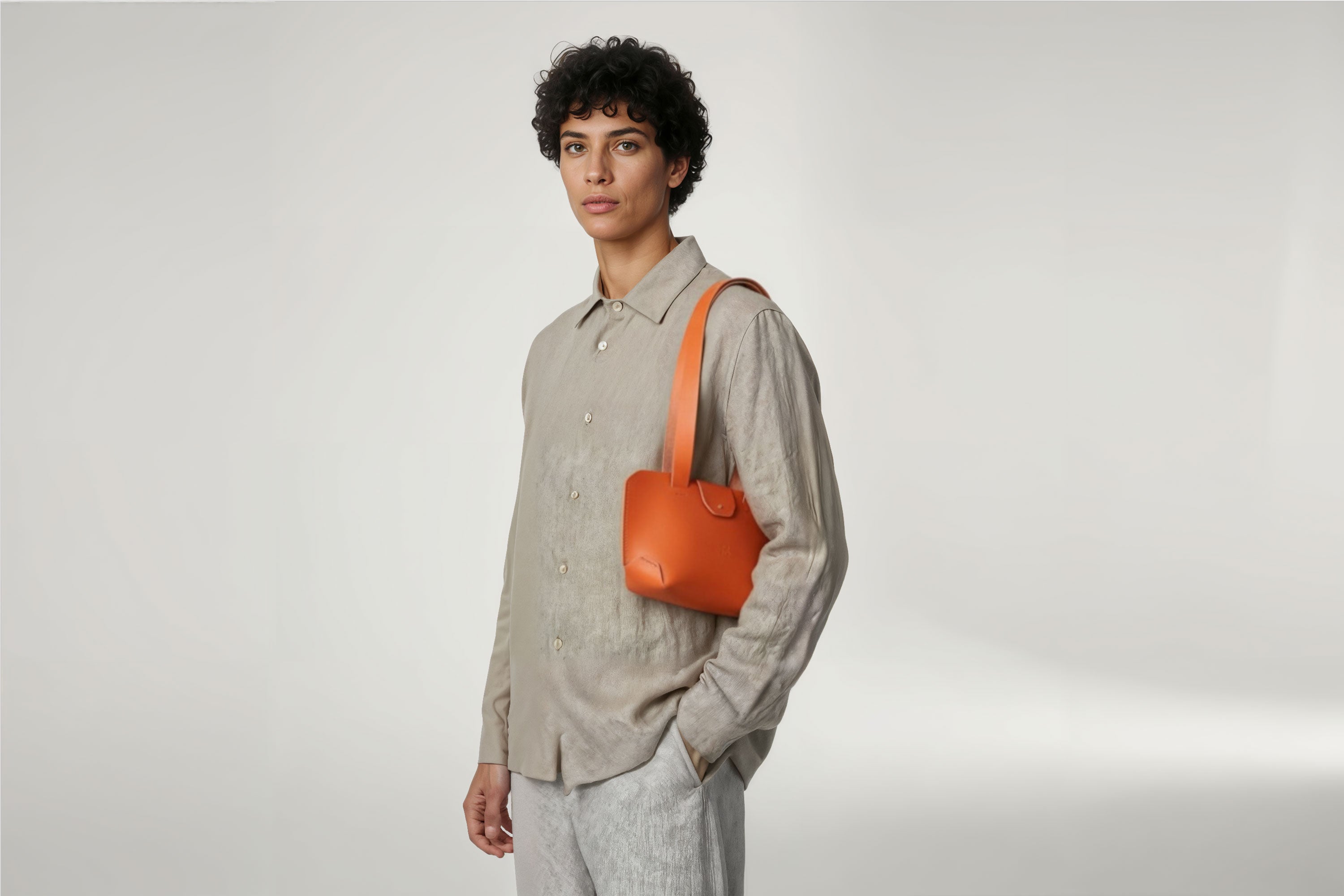 Medium Tote Bag Orange Color On Woman Model Leather Premium Quality Minimalist Modern Design Atelier Madre Manuel Dreesmann Barcelona Spain