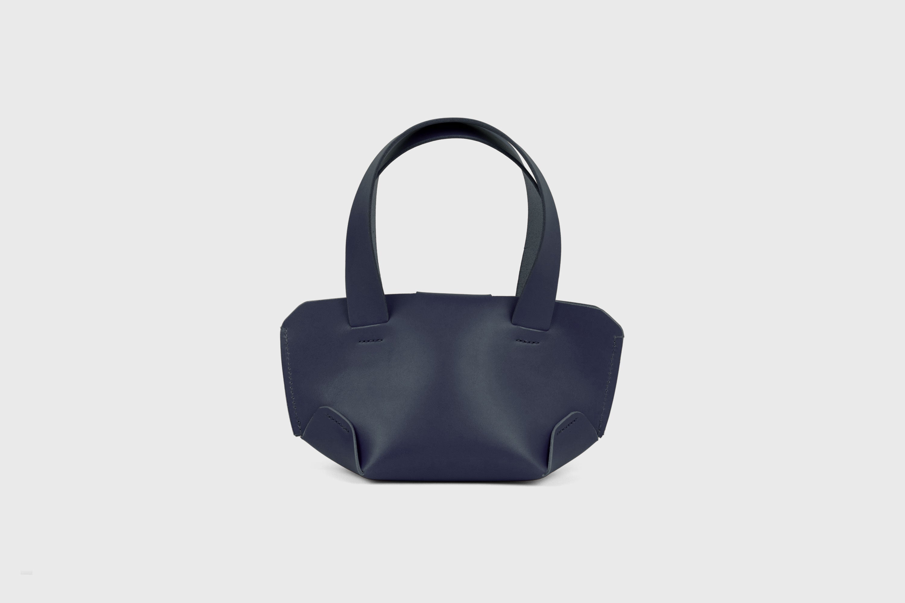 Mini Tote Bag In Marine Blue Color In Vegetable Tanned Leather Bag With A Flap In Minimalistic Design Atelier Madre Manuel Dreesmann