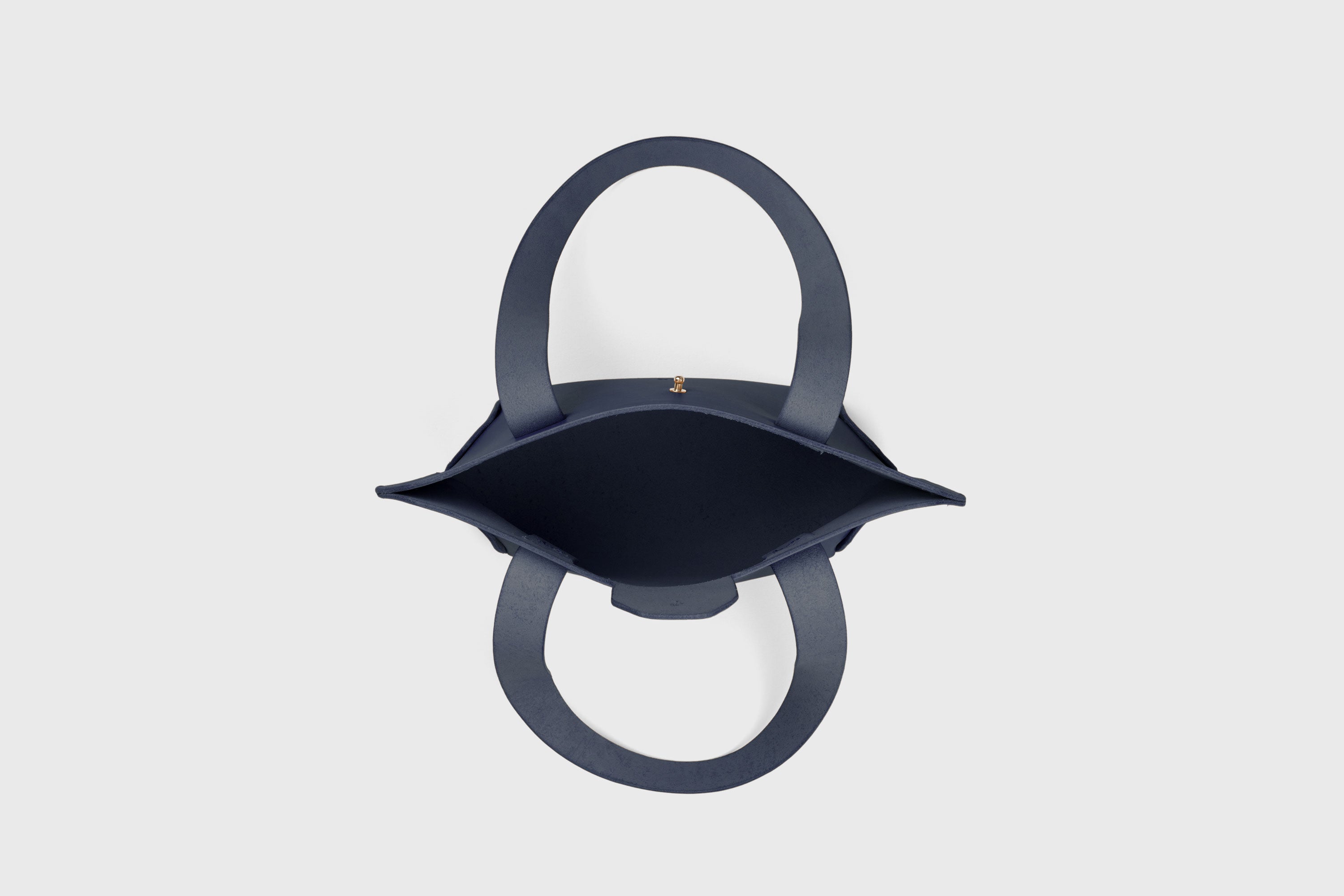 Mini Tote Bag In Marine Blue Color In Vegetable Tanned Leather Bag With A Flap In Minimalistic Design Atelier Madre Manuel Dreesmann