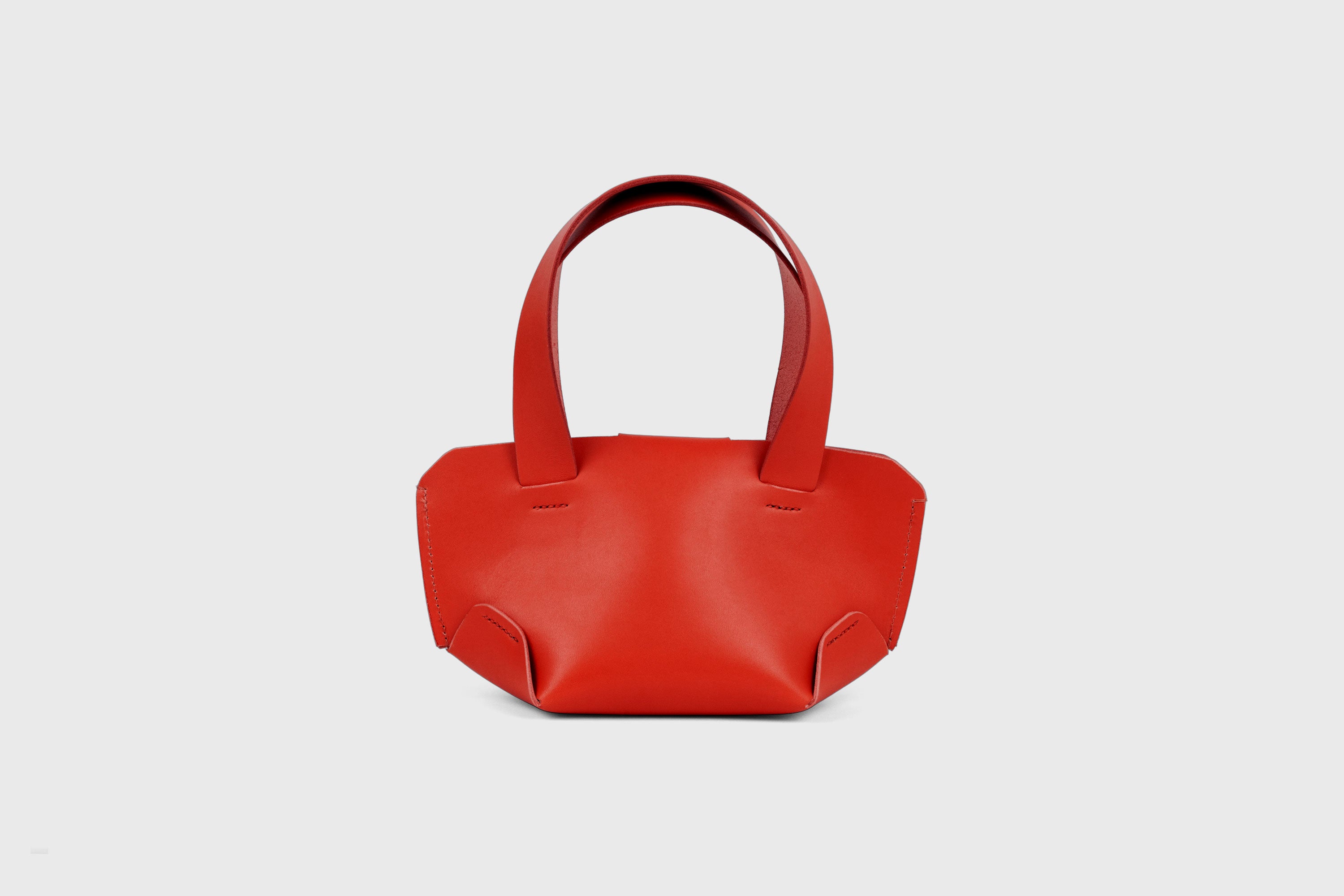 Mini Tote Bag In Red Color In Vegetable Tanned Leather Bag With A Flap In Minimalistic Design Atelier Madre Manuel Dreesmann