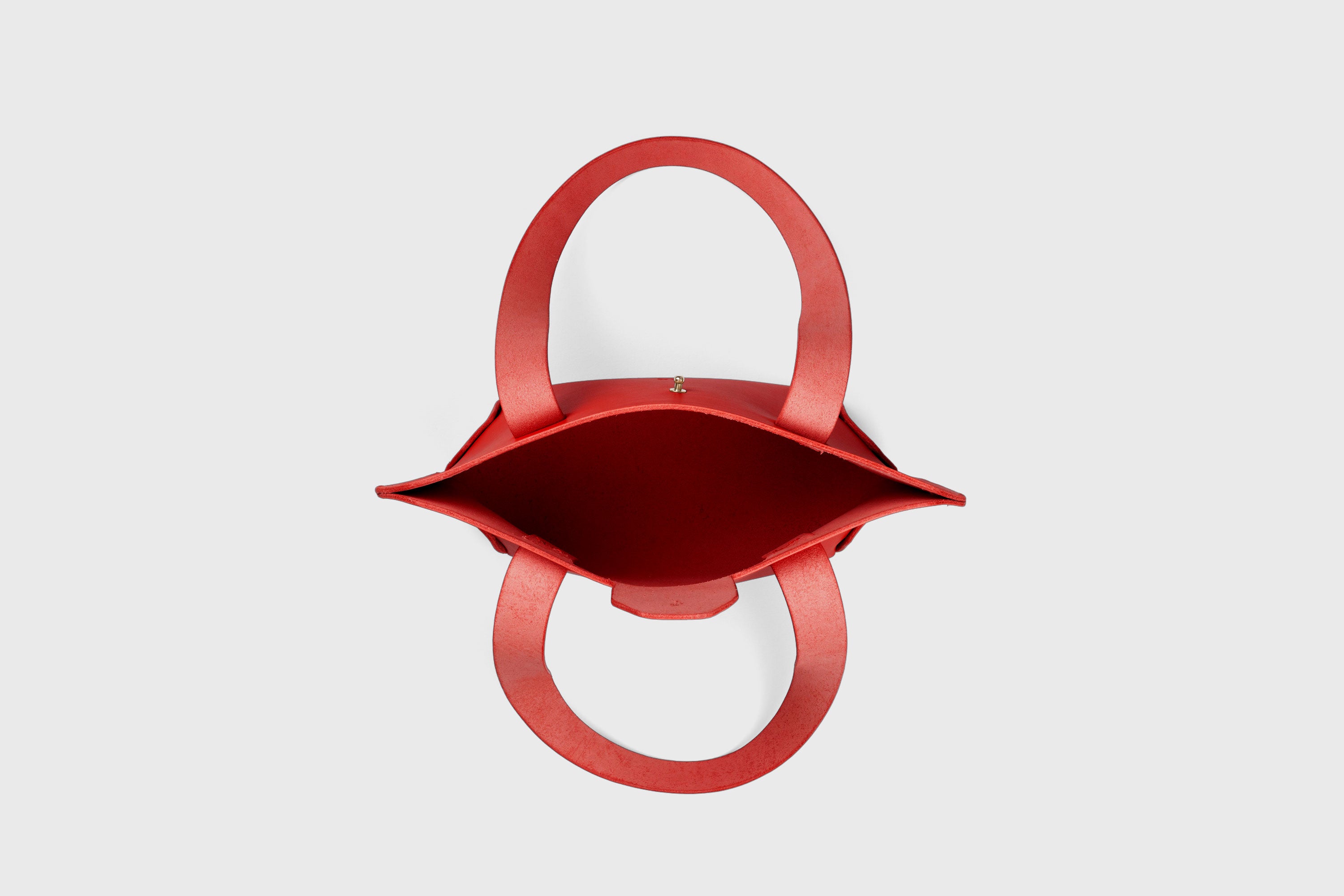 Mini Tote Bag In Red Color In Vegetable Tanned Leather Bag With A Flap In Minimalistic Design Atelier Madre Manuel Dreesmann