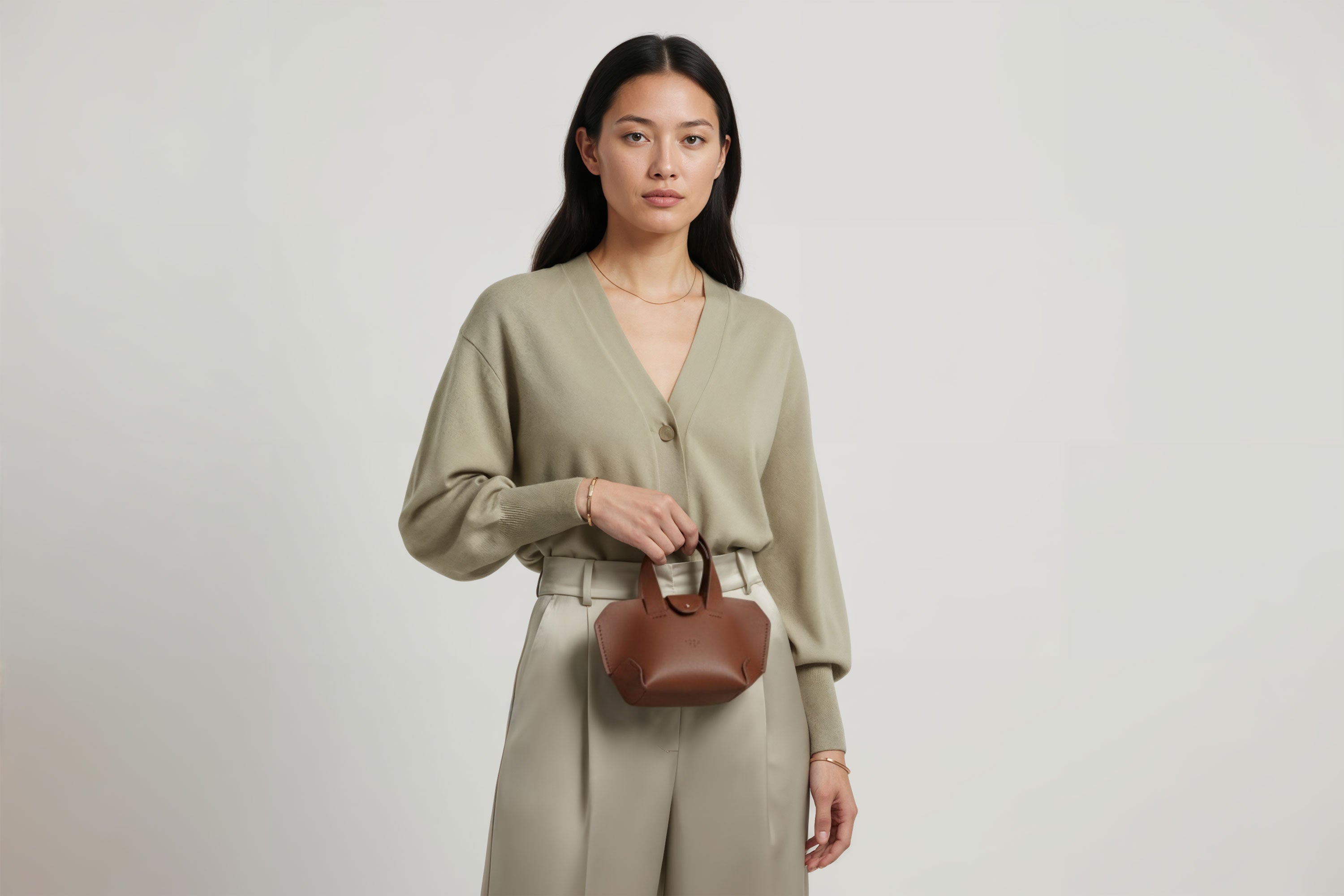 Nano Leather Tote Bag Dark Brown Color On A Woman Model Premium Quality Minimalist Design Atelier Madre Manuel Dreesmann Barcelona Spain