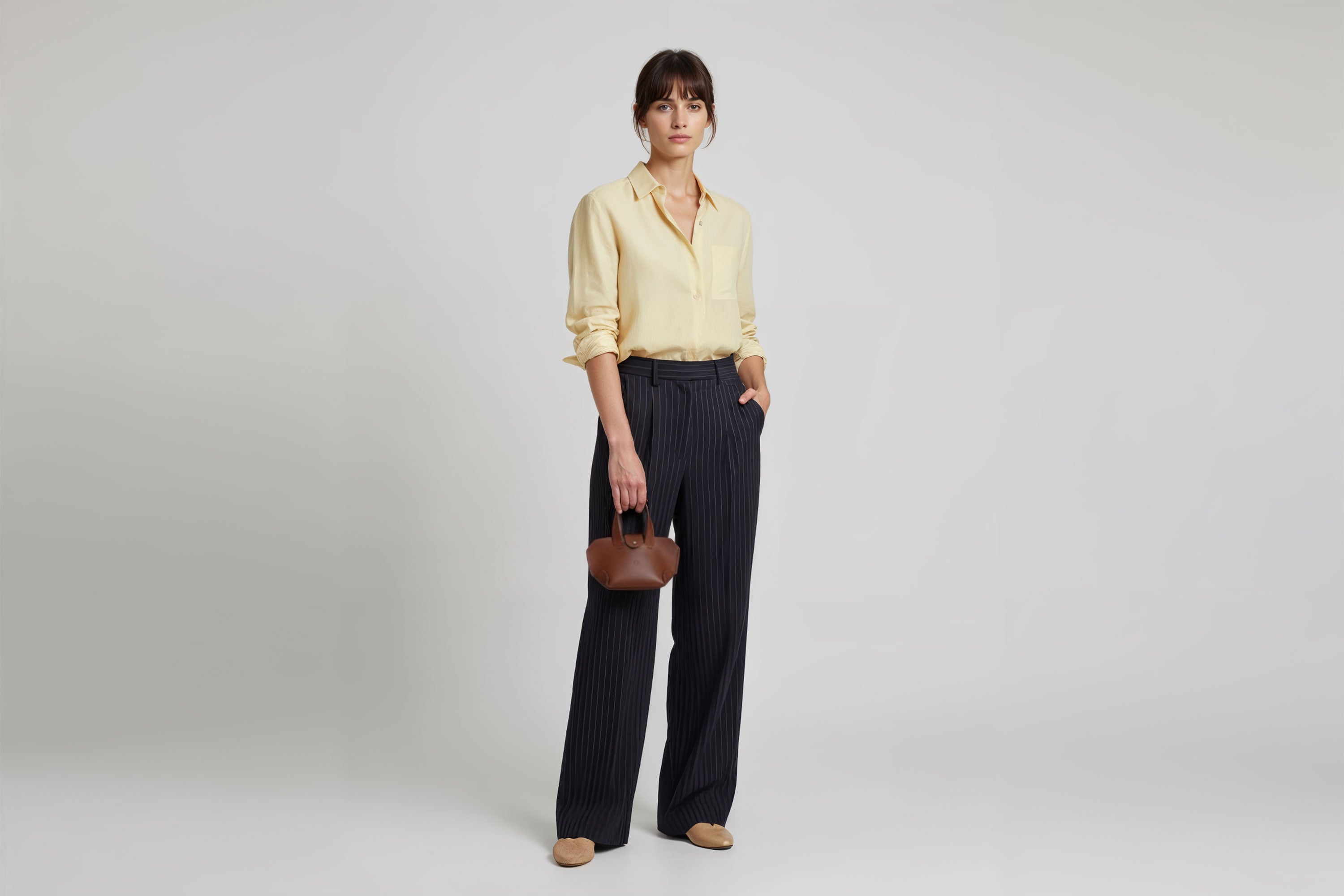 Nano Leather Tote Bag Dark Brown Color On A Woman Model Premium Quality Minimalist Design Atelier Madre Manuel Dreesmann Barcelona Spain