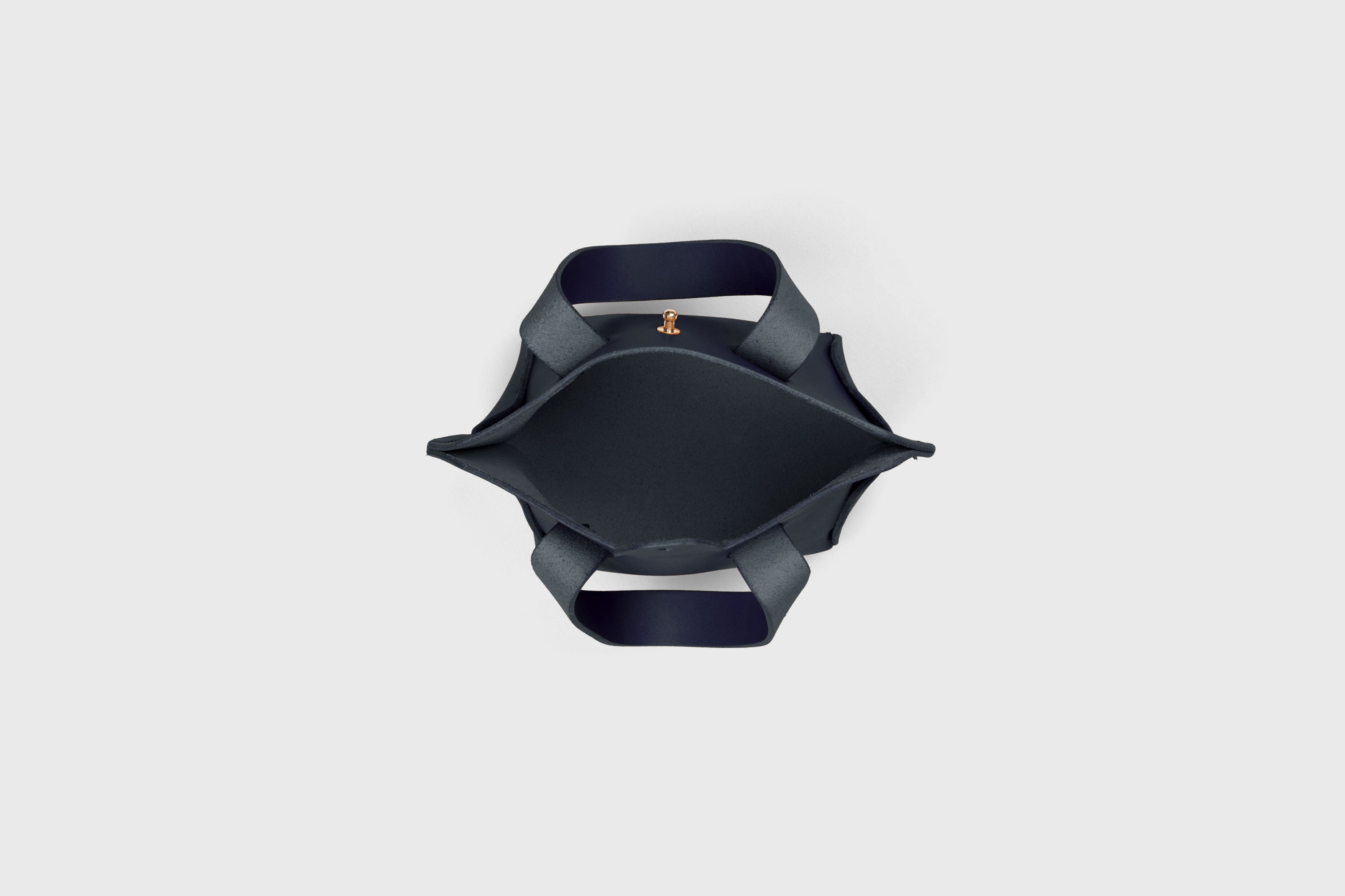 Nano Tote Bag In Marine Blue Color In Vegetable Tanned Leather Minimalistic Design Atelier Madre Manuel Dreesmann Barcelona Spain