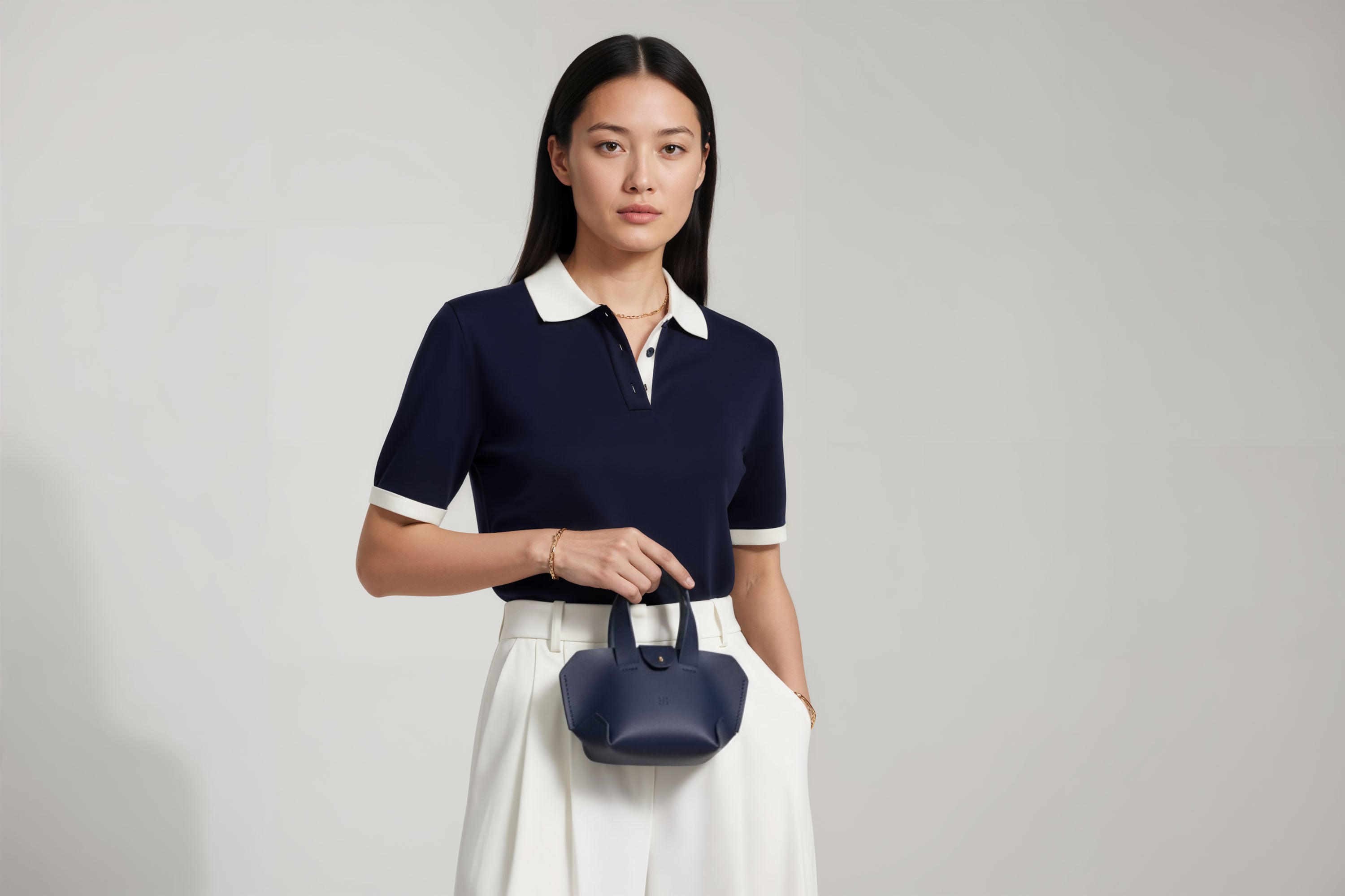 Nano Leather Tote Bag Marine Blue Color On A Woman Model Premium Quality Minimalist Design Atelier Madre Manuel Dreesmann Barcelona Spain